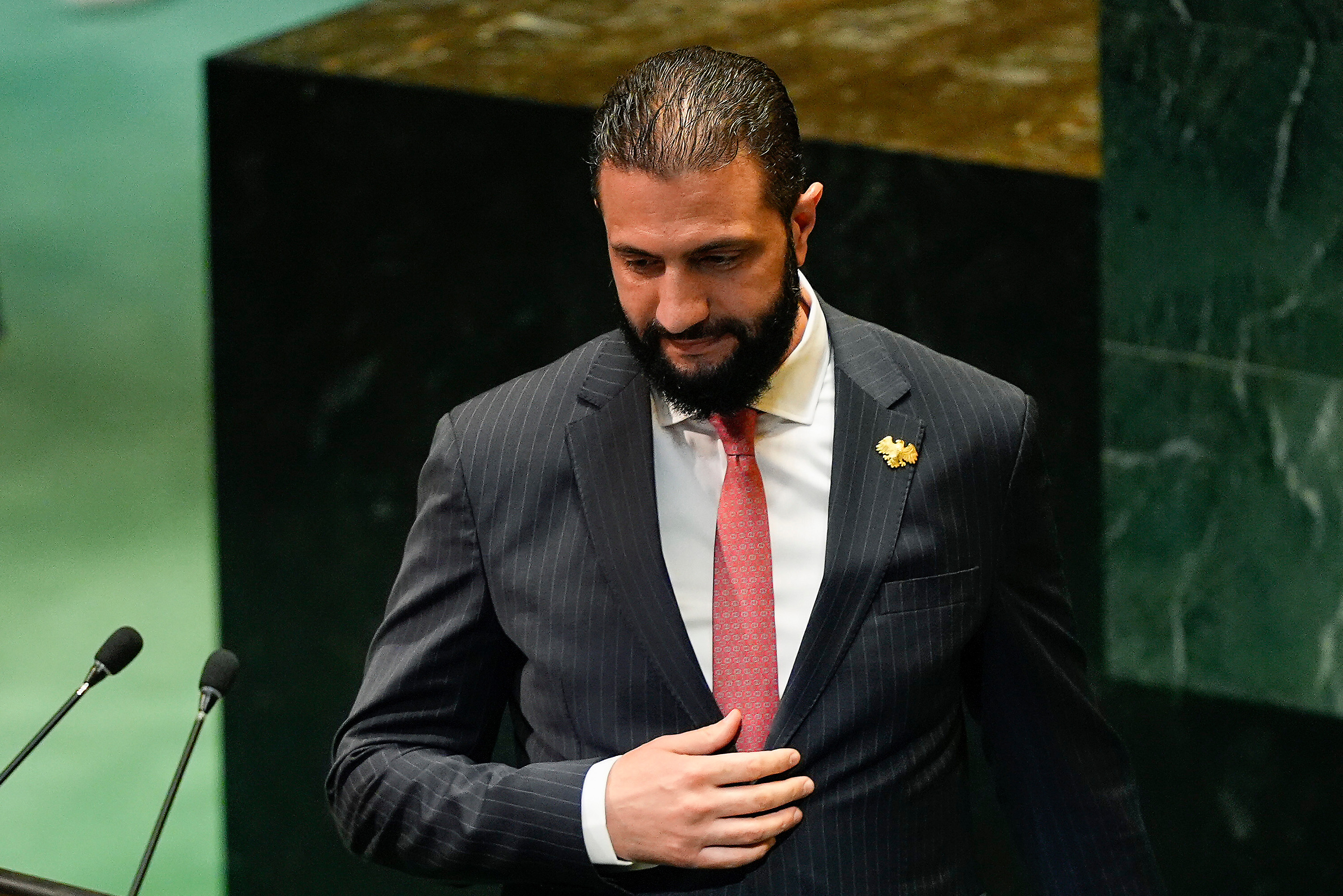 Syria President Ahmad Al-Sharaa approaches the podium to speak during the 80th session of the United Nations General Assembly, Wednesday, Sept. 24, 2025, at U.N. headquarters. [Yuki Iwamura/AP Photo]