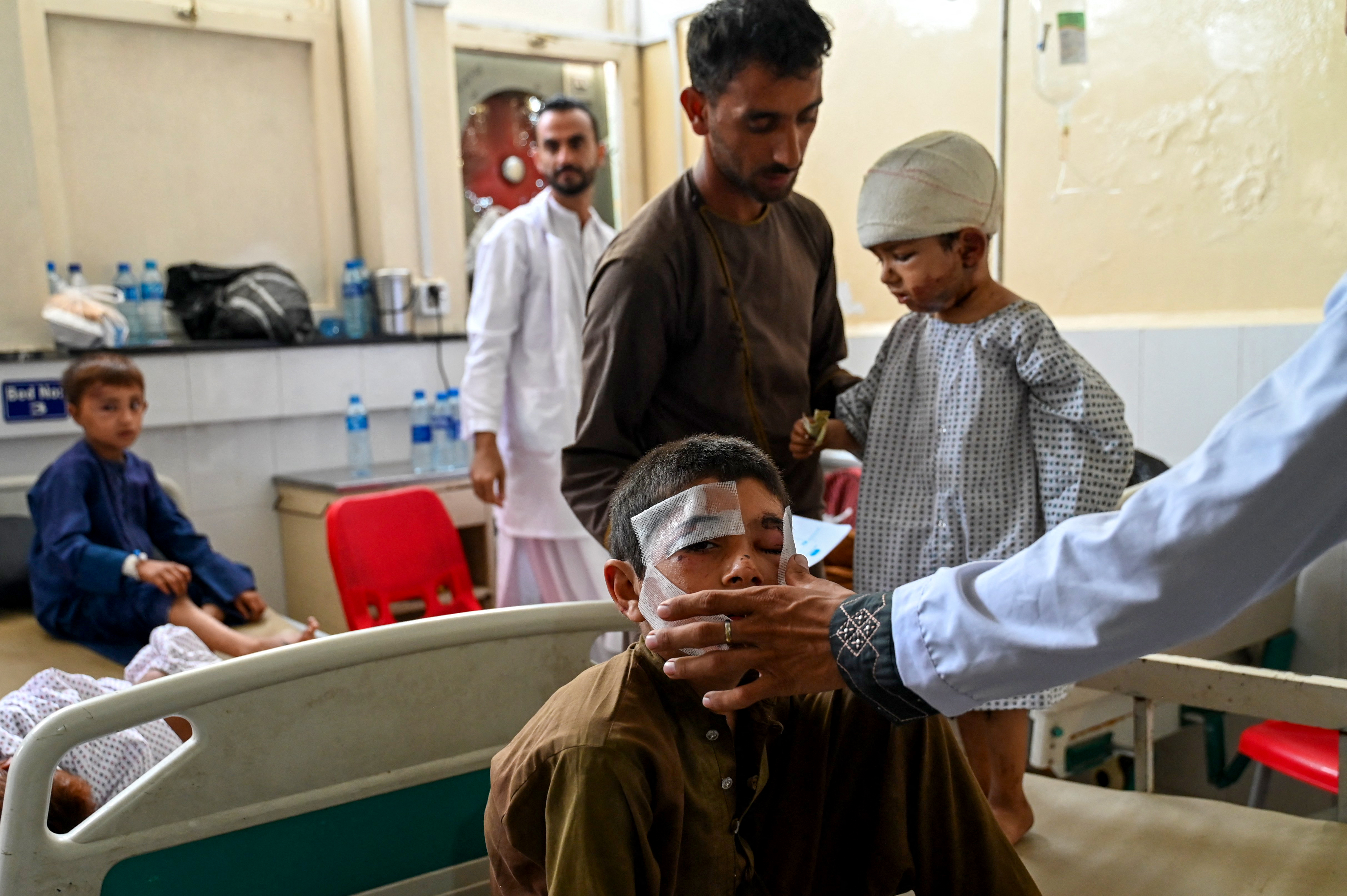 EDITORS NOTE: Graphic content / Afghan boys injured during earthquakes, receive treatment at a hospital in Jalalabad on September 2, 2025.