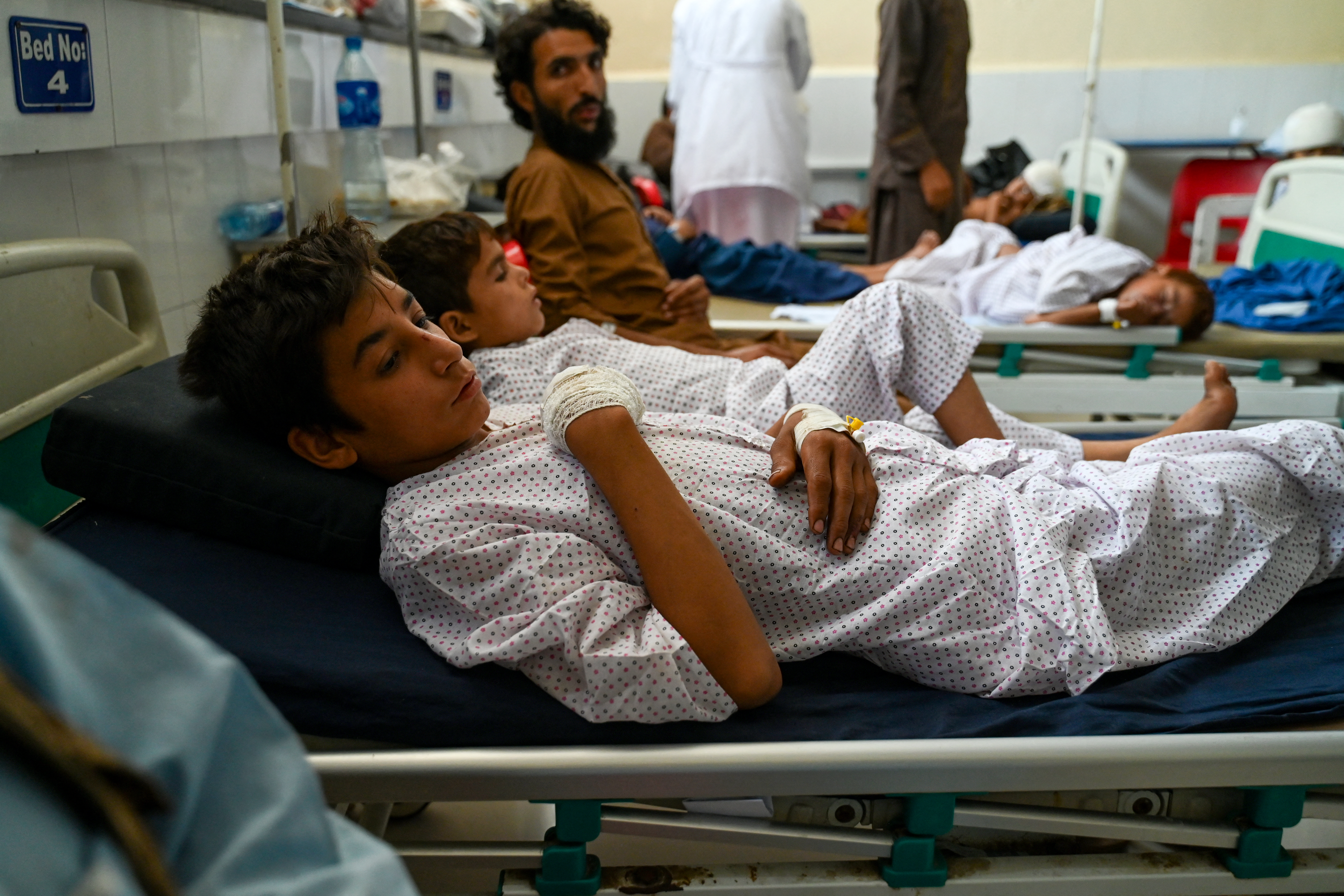 EDITORS NOTE: Graphic content / Afghan boys injured during earthquakes, receive treatment at a hospital in Jalalabad on September 2, 2025.
