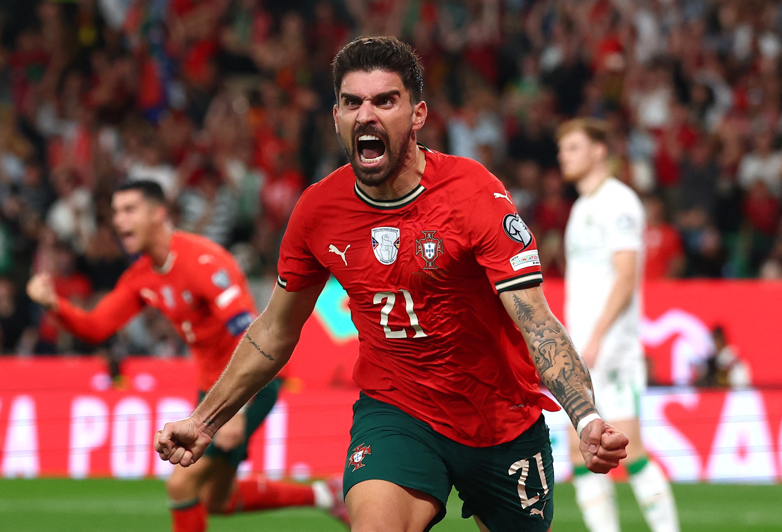 Portugal's Ruben Neves celebrates scoring their first goal