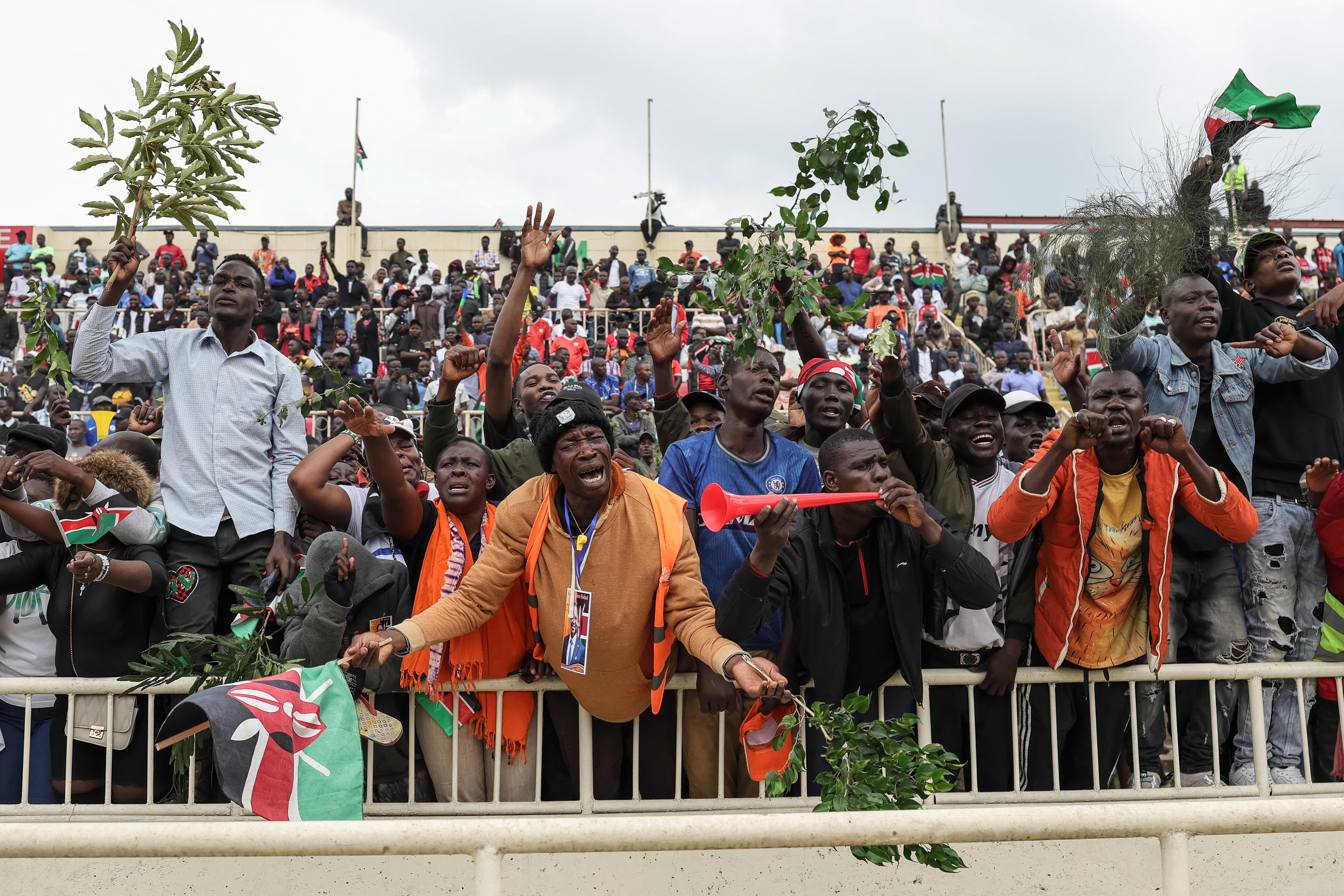 Mourners react in grief while attending the state funeral of Kenya's opposition leader and former Prime Minister Raila Odinga.