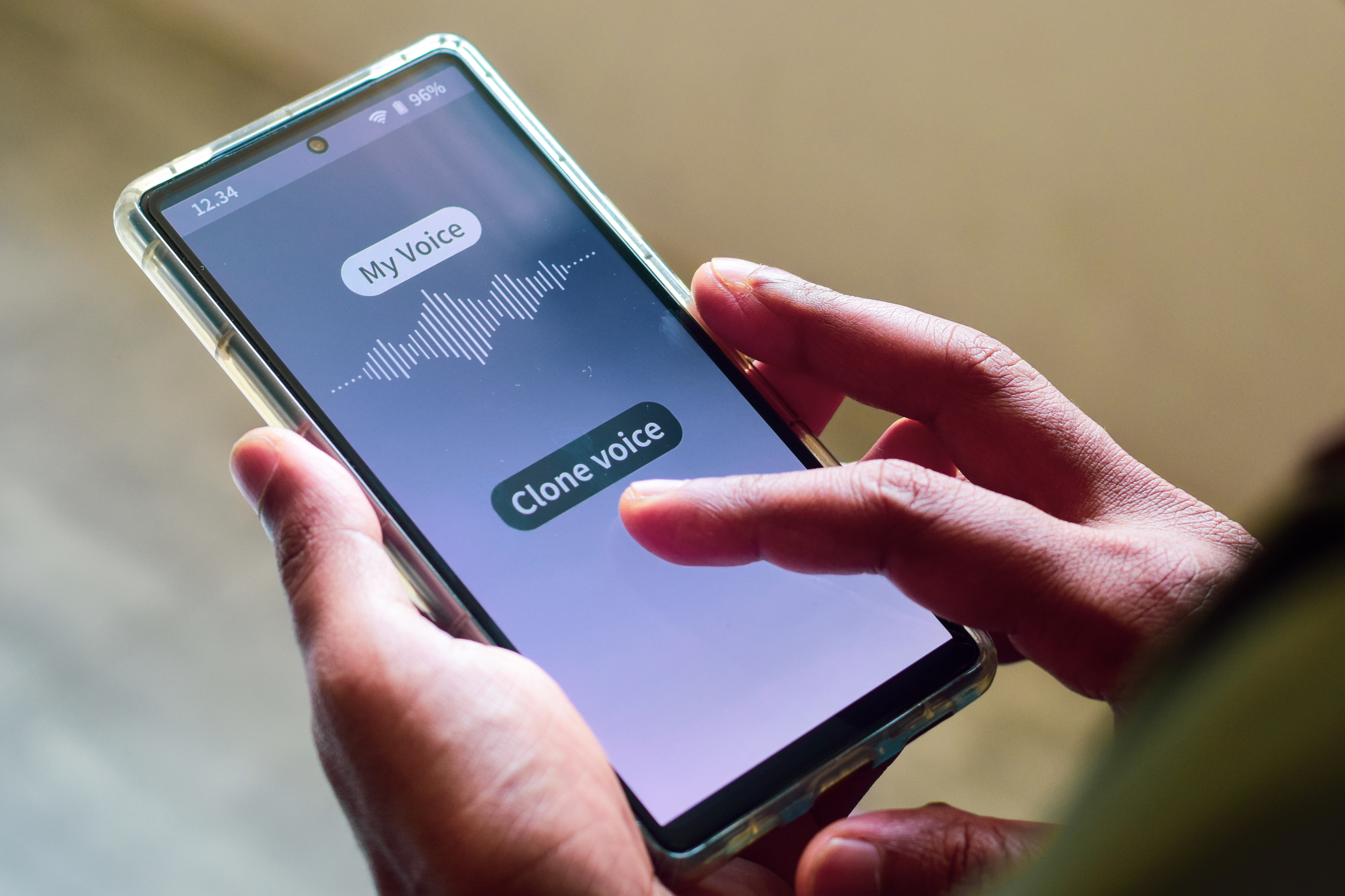 Man using mobile applications for cloning his voice