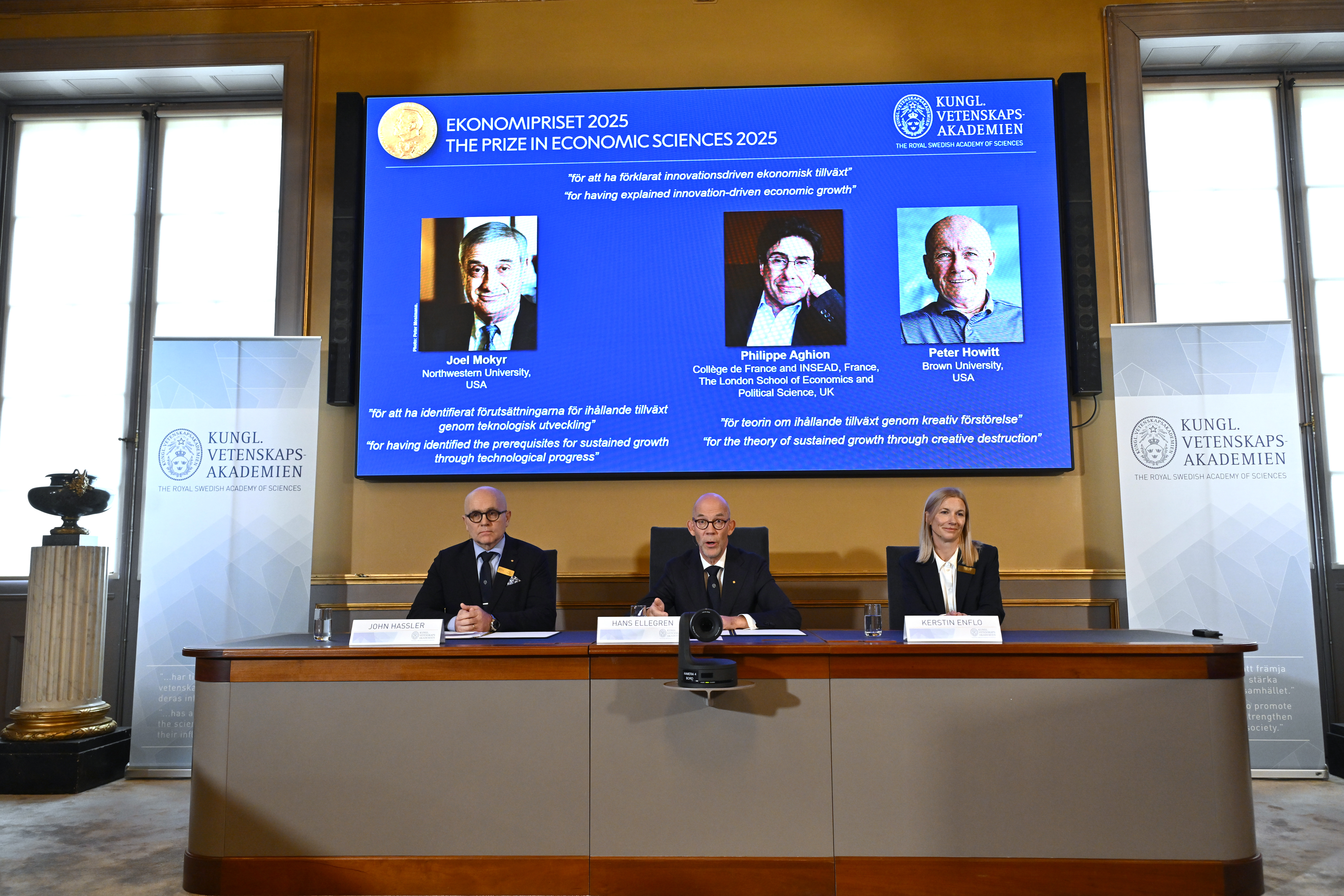 epa12450304 (from L) Professor John Hassler, Chairman of the Committee for the Prize in Economic Sciences in Memory of Alfred Nobel, Hans Ellegren, Permanent Secretary of the Academy of Sciences and Professor Kerstin Enflo, Member of the Committee for the Prize in Economic Sciences in Memory of Alfred Nobel announce the winners of the Nobel Prize in Economics 2025 in Stockholm, Sweden, 13 October 2025. The Sveriges Riksbank Prize in Economic Sciences in Memory of Alfred Nobel, the Nobel Prize in Economic Sciences 2025, is being awarded to Joel Mokyr, Northwestern University, Evanston, IL, USA, Philippe Aghion, College de France and INSEAD, Paris, France, The London School of Economics and Political Science, UK and Peter Howitt, Brown University, Providence RI, USA. EPA/ANDERS WIKLUND SWEDEN OUT