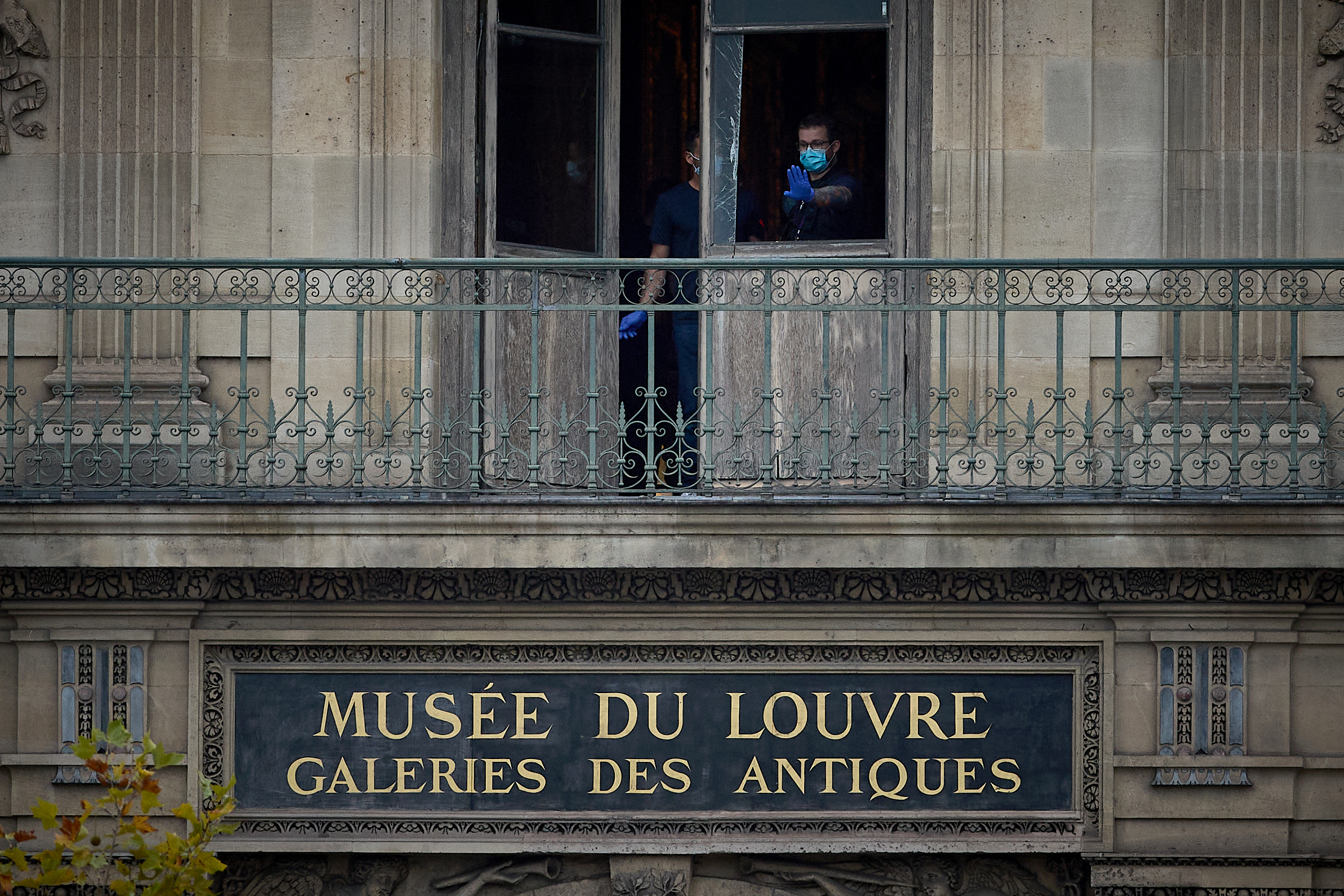 PARIS, FRANCE - OCTOBER 19: A French Crime Scene Officer gestures as they examine the cut window of a gallery at the Louvre Museum used in a robbery at the world famous museum on October 19, 2025 in Paris, France. France's Culture Minister, Rachida Dati, announced the closure of the world-famous art museum on X due to the robbery taking place just after the Louvre opened to the public. It is being reported that millions of pound with of historic jewellery belonging to Napoleon and Empress Josephine has been stolen (Photo by Kiran Ridley/Getty Images)