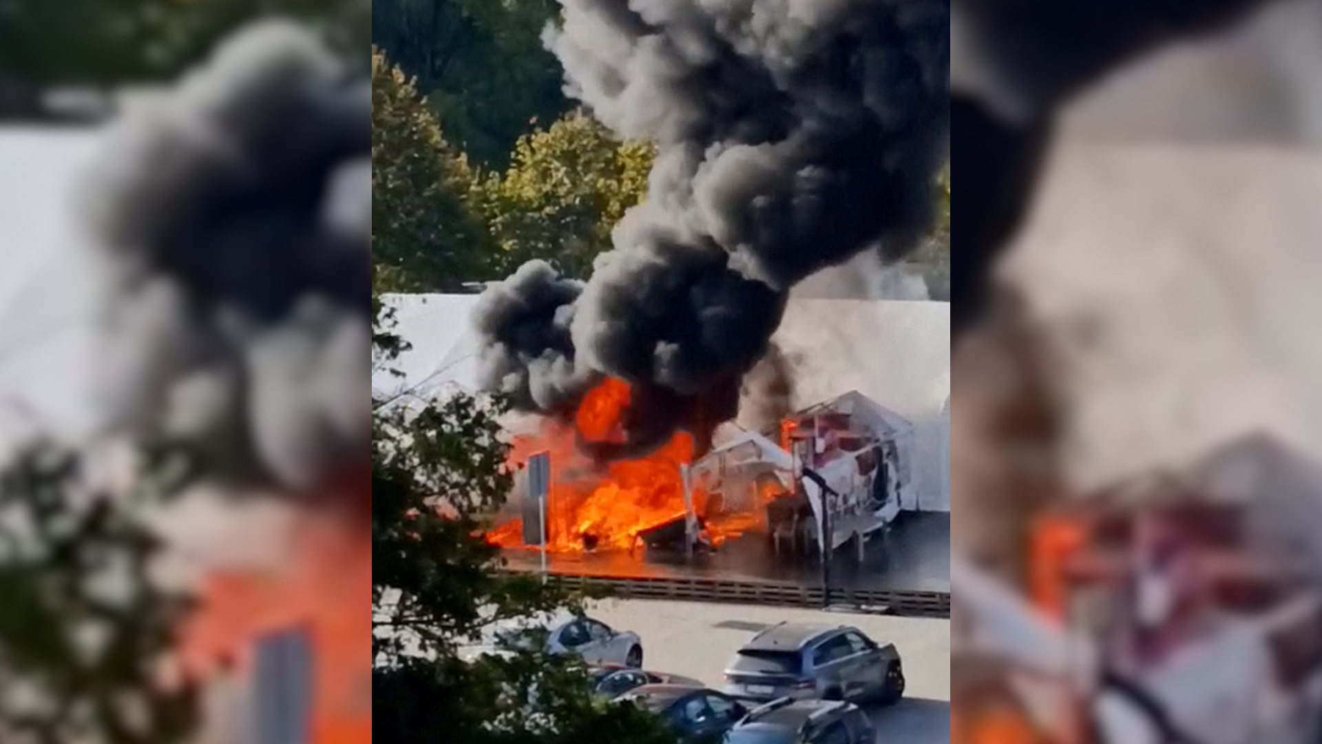 Smoke rises from a burning tent in front of the Parliament in Belgrade, Serbia, in this screen grab obtained from a handout video released on Oct. 22, 2025. [Marina Jankulovic/Handout via Reuters]
