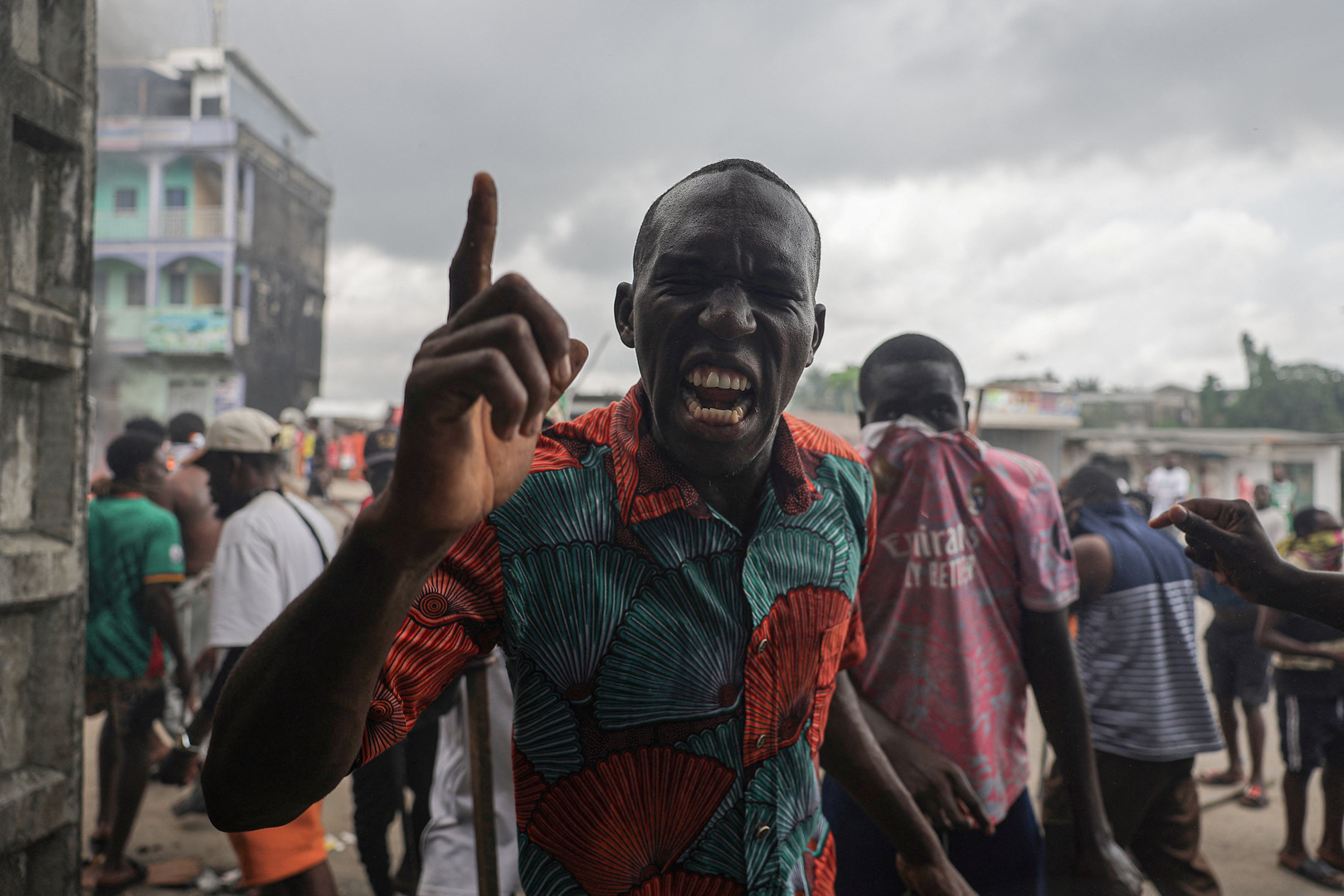 A supporter of the Cameroon opposition candidate Issa Tchiroma reacts during clashes with security forces after the Constitutional Council declared President Paul Biya as the winner of the Oct. 12 presidential election, in Douala, Cameroon on Oct. 27, 2025. [Zohra Bensemra/Reuters]