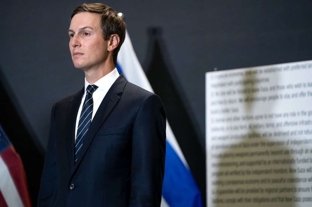 Jared Kushner speaks during a press conference following a military briefing at the Civilian Military Coordination Center in southern Israel on October 21, 2025. [File: Nathan Howard/AFP]
