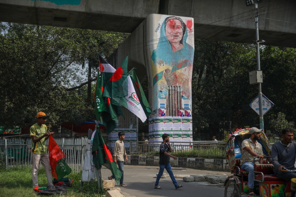 A wall painting depicting former Prime Minister Sheikh Hasina is displayed during her verdict day in Dhaka, Bangladesh