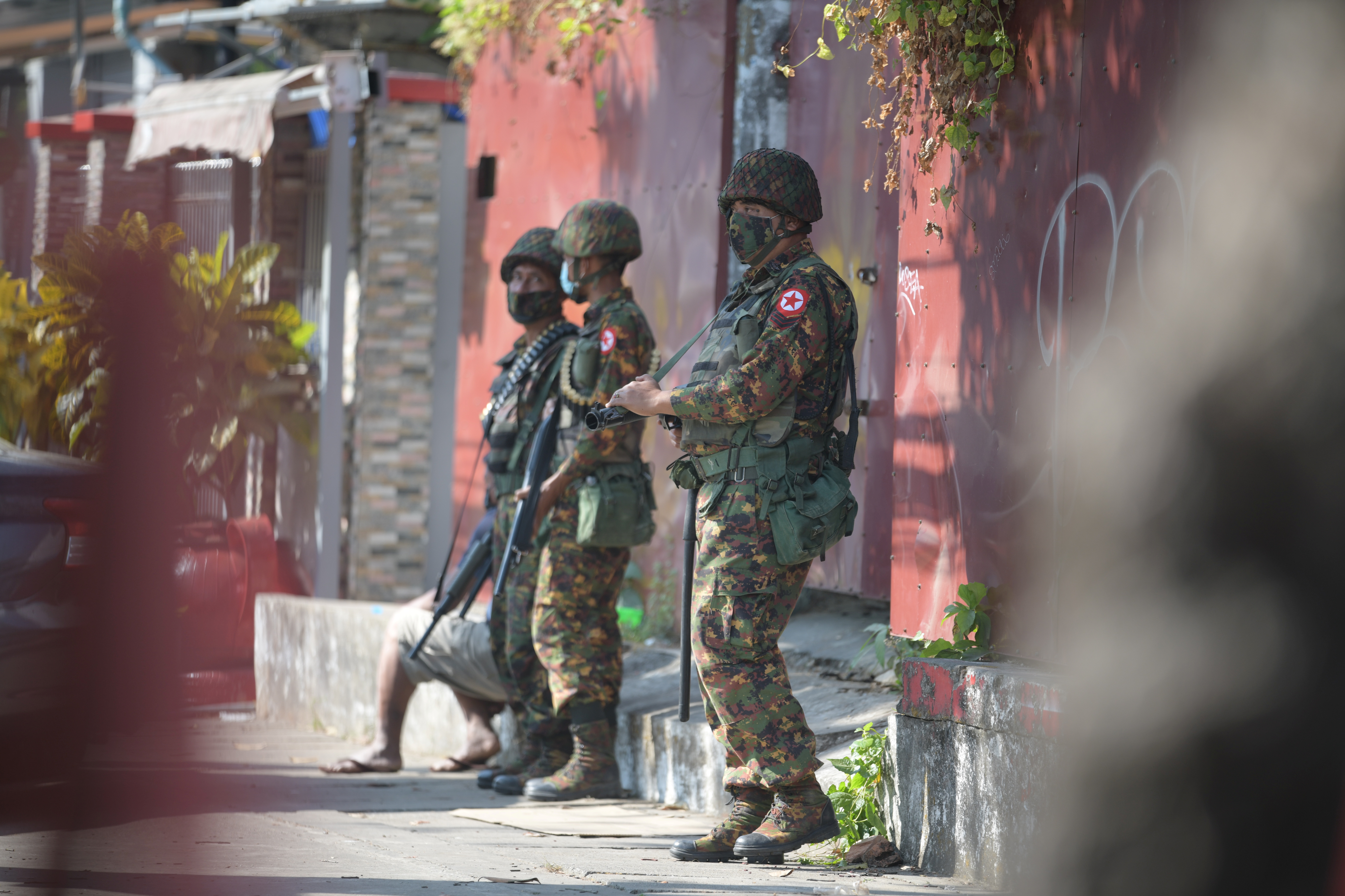 Soldiers search the headquarters of the National League for Democracy (NLD) after the coup in Yangon, Myanmar, February 15, 2021. REUTERS/Stringer