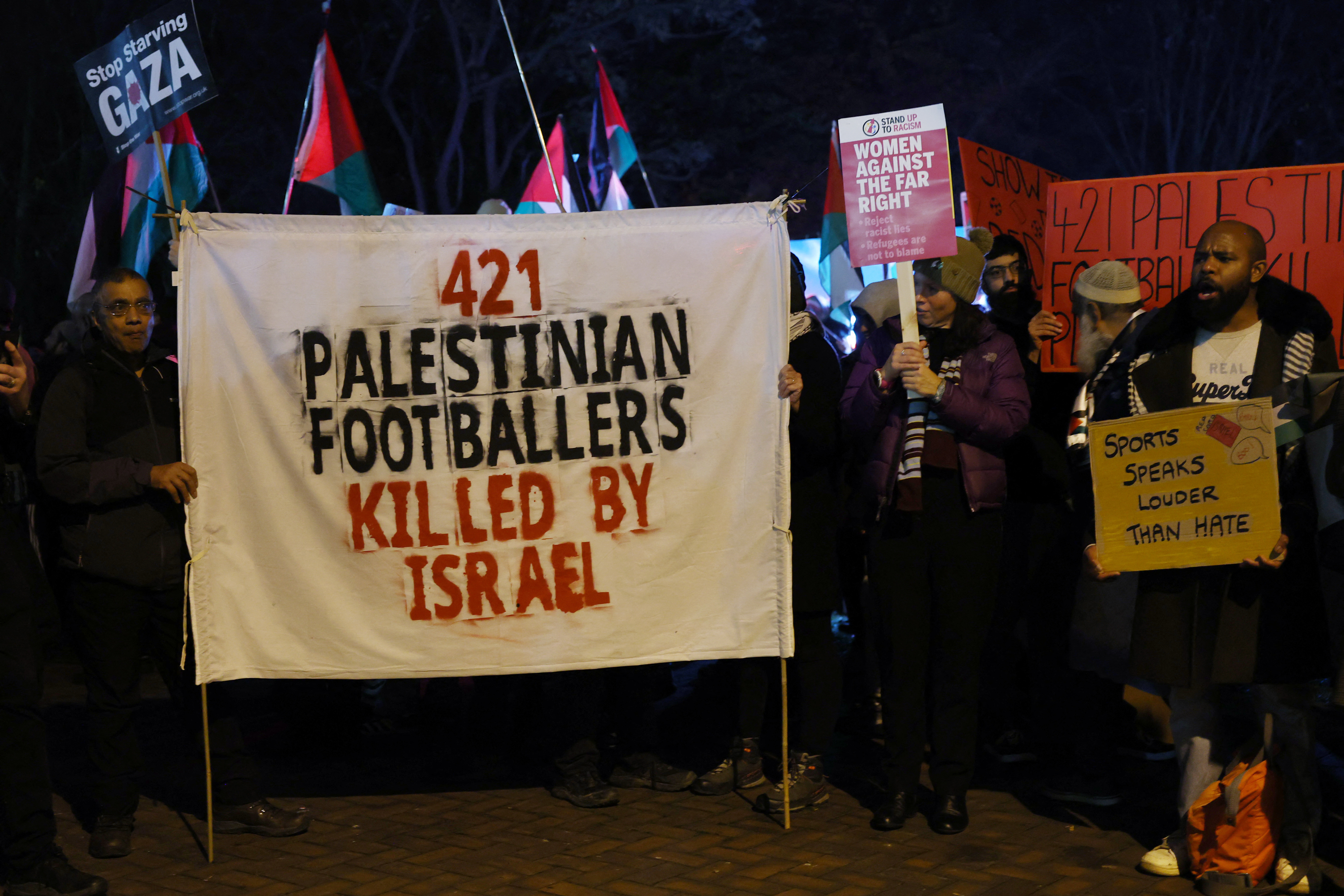 Sign that says: 421 Palestinian footballers killed by Israel