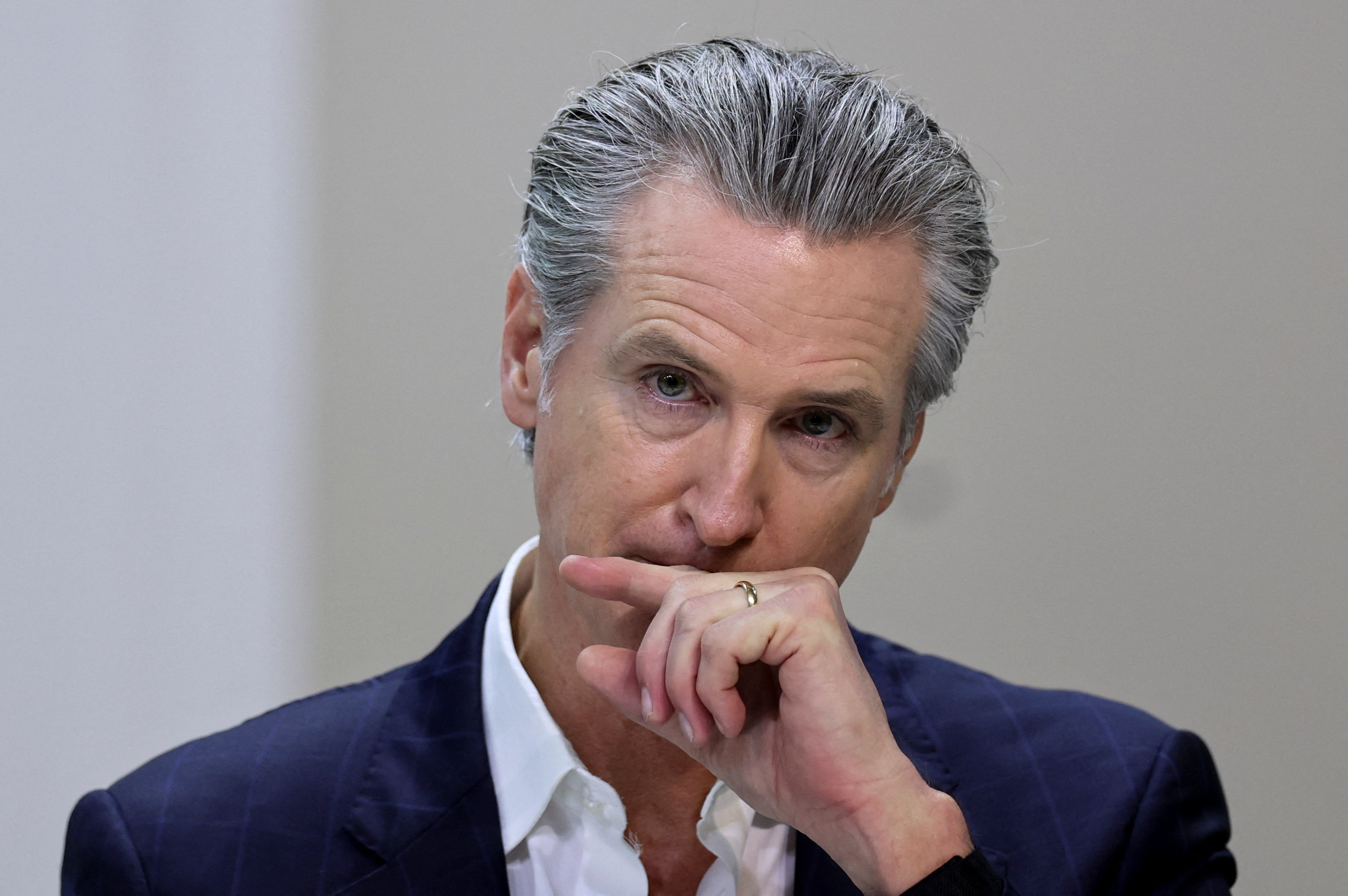 California Governor Gavin Newsom attends a press conference [Adriano Machado/Reuters]