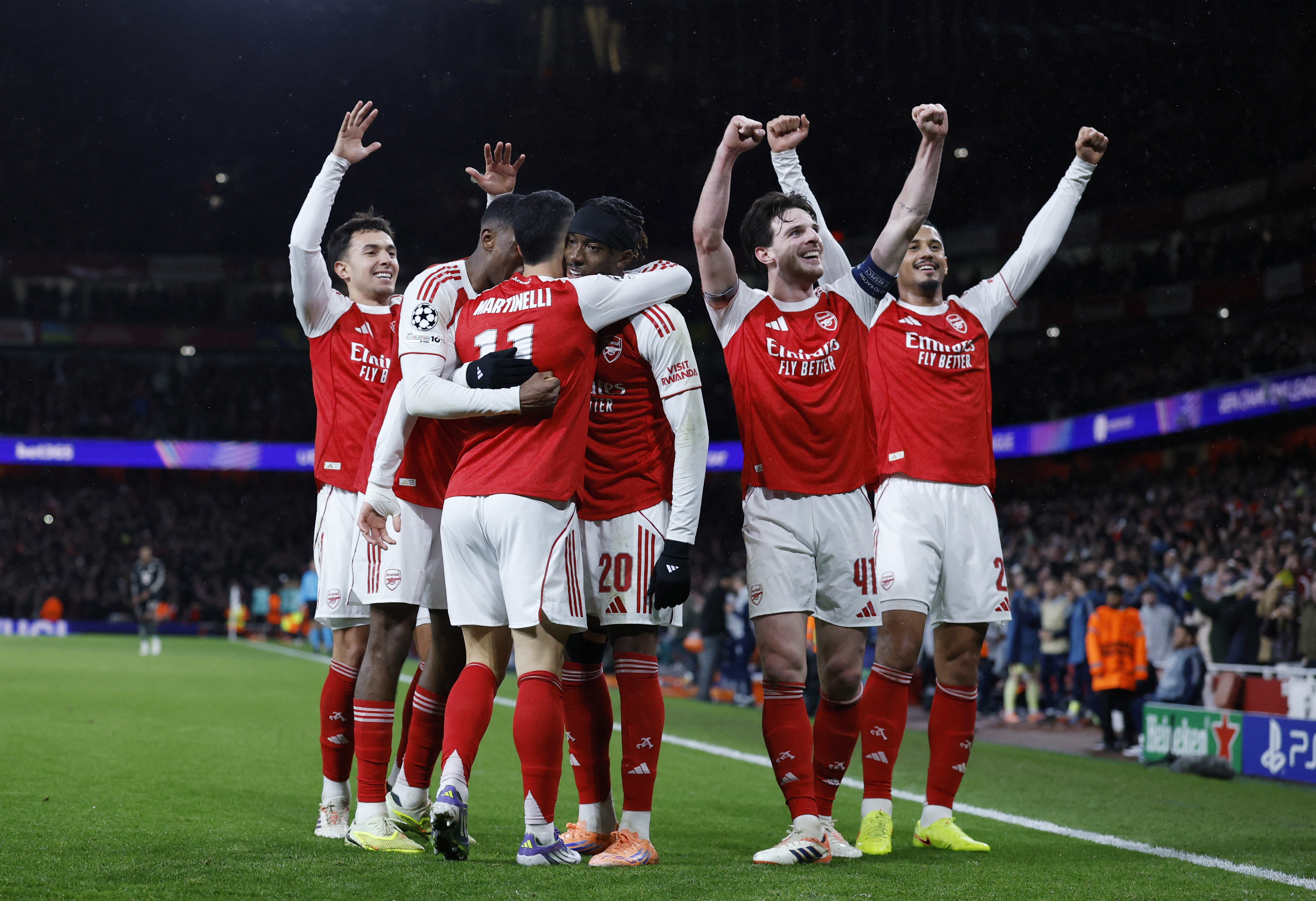 Arsenal's Gabriel Martinelli celebrates scoring their third goal with teammates