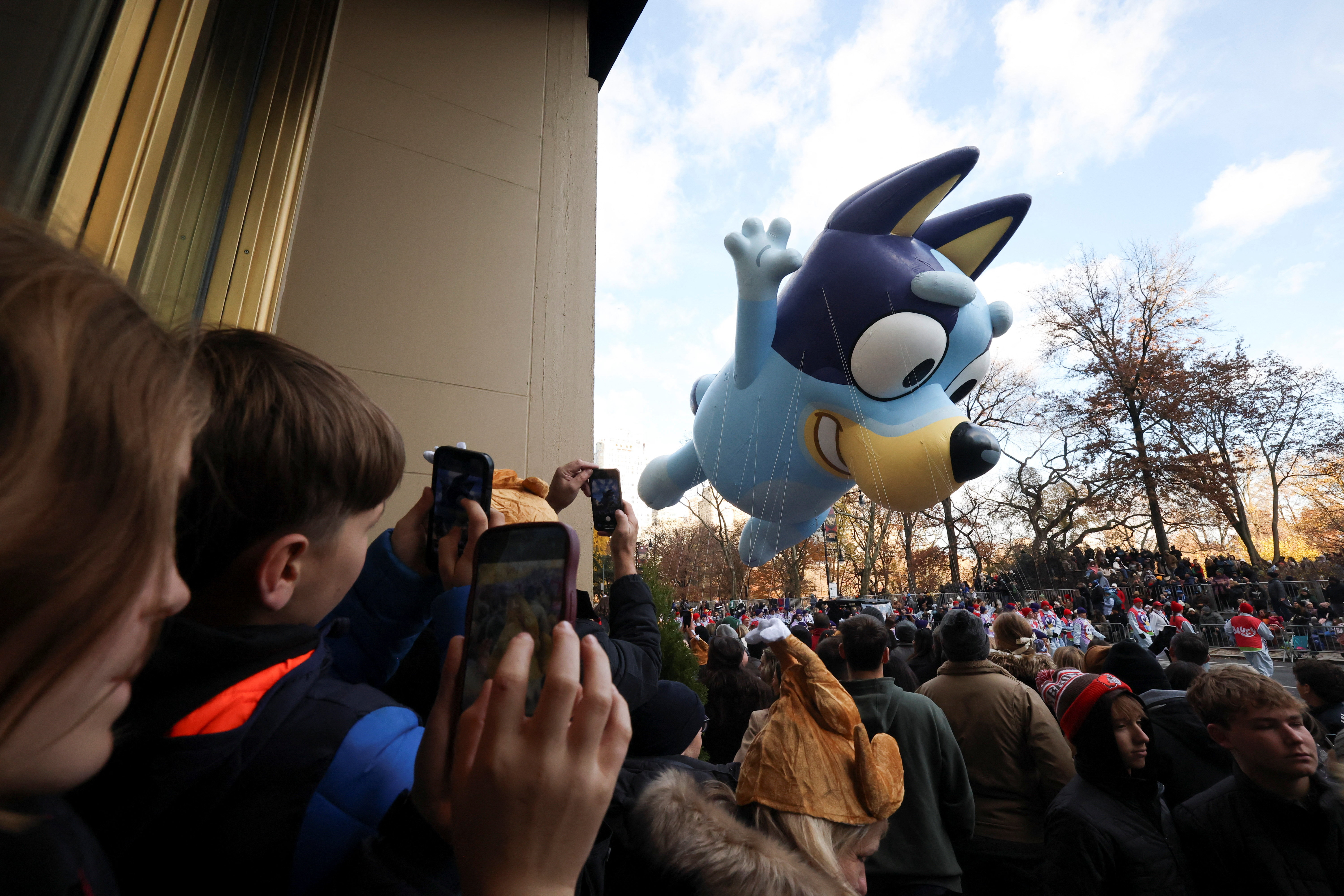 A balloon of the cartoon dog Bluey at the Macy's Thanksgiving parade