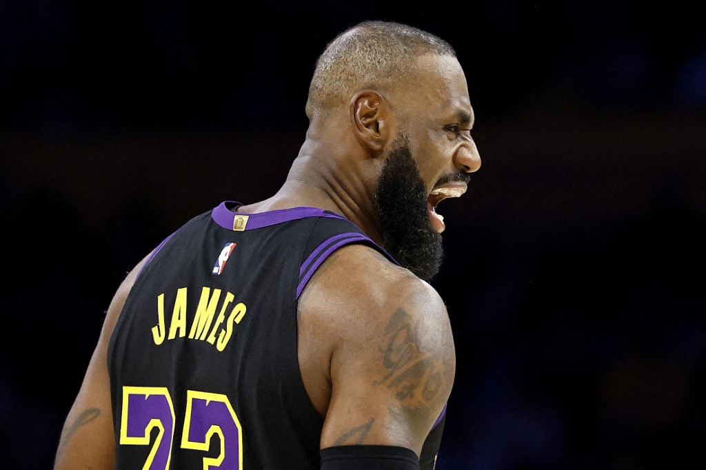 LeBron James added 11 points in 30 minutes of his record-breaking season debut for the Los Angeles Lakers against the Utah Jazz in Los Angeles [Ronald Martinez/Getty Images via AFP]