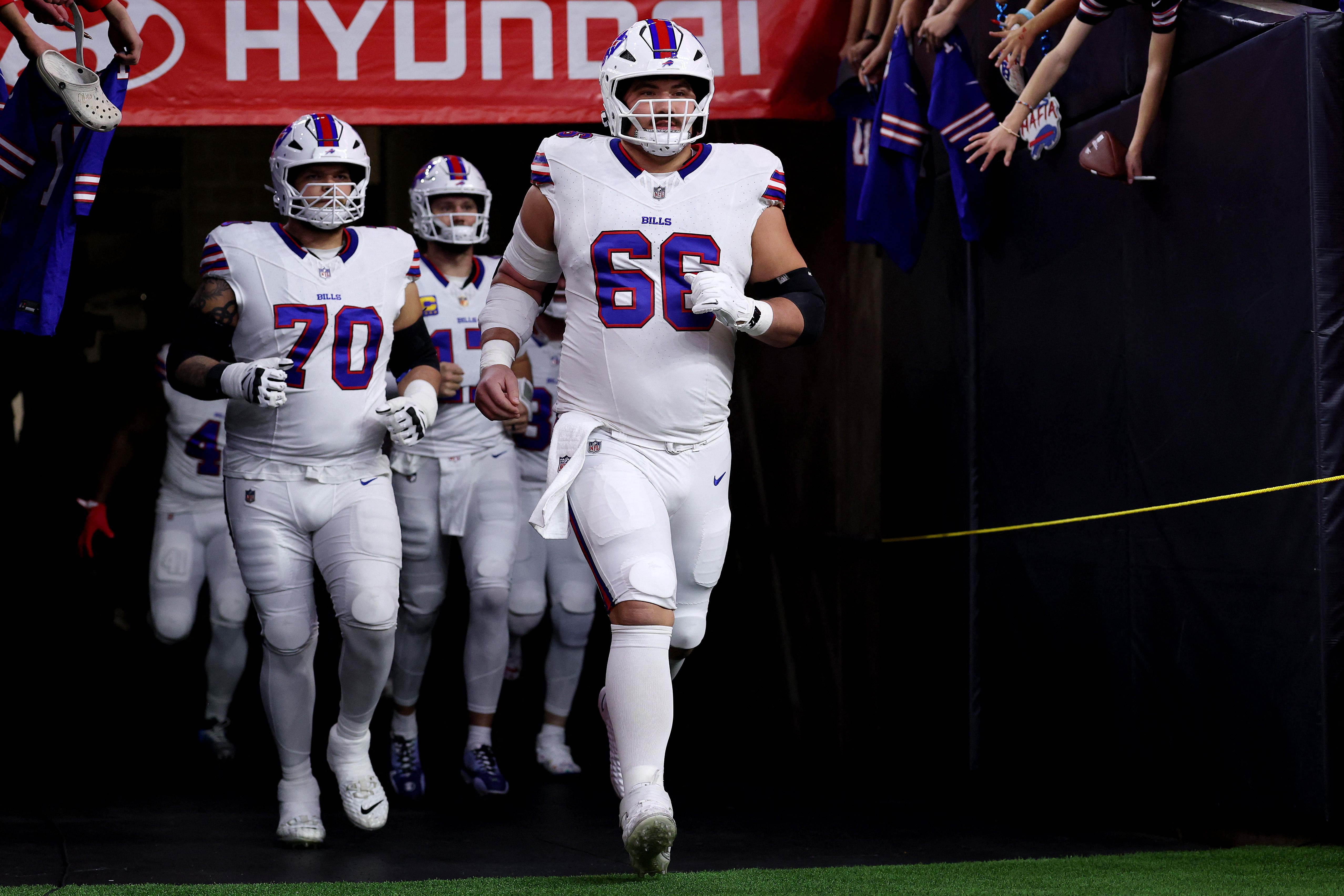 Connor McGovern #66 of the Buffalo Bills walks out of the tunnel before the game against the Houston Texans at NRG Stadium on November 20, 2025 in Houston, Texas [Tim Warner/Getty Images/AFP]