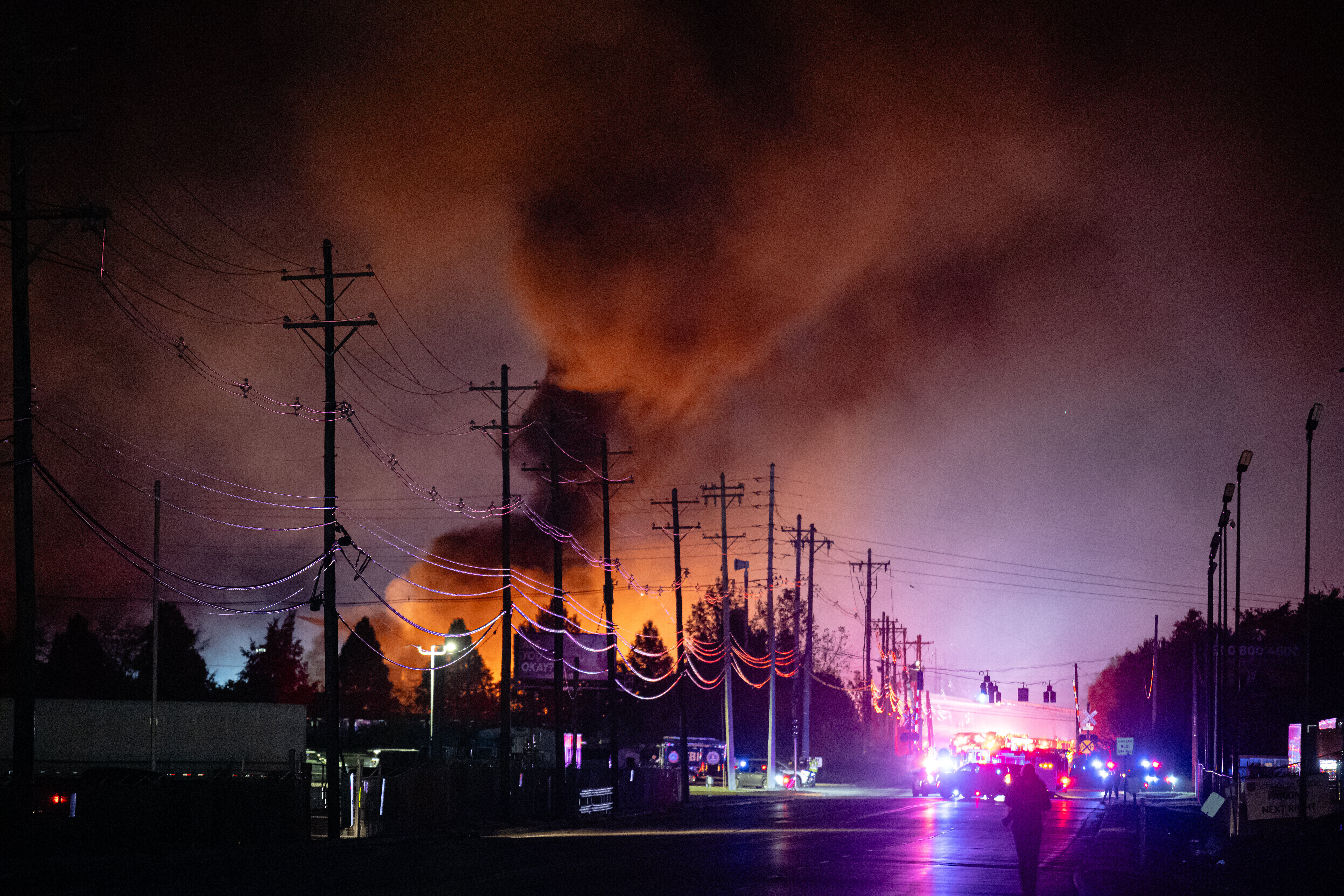 Plumes of smoke rise from the area where a UPS cargo plane crashed at Muhammad Ali international airport, on November 4, 2025, in Louisville, Kentucky [Jon Cherry/AP Photo]