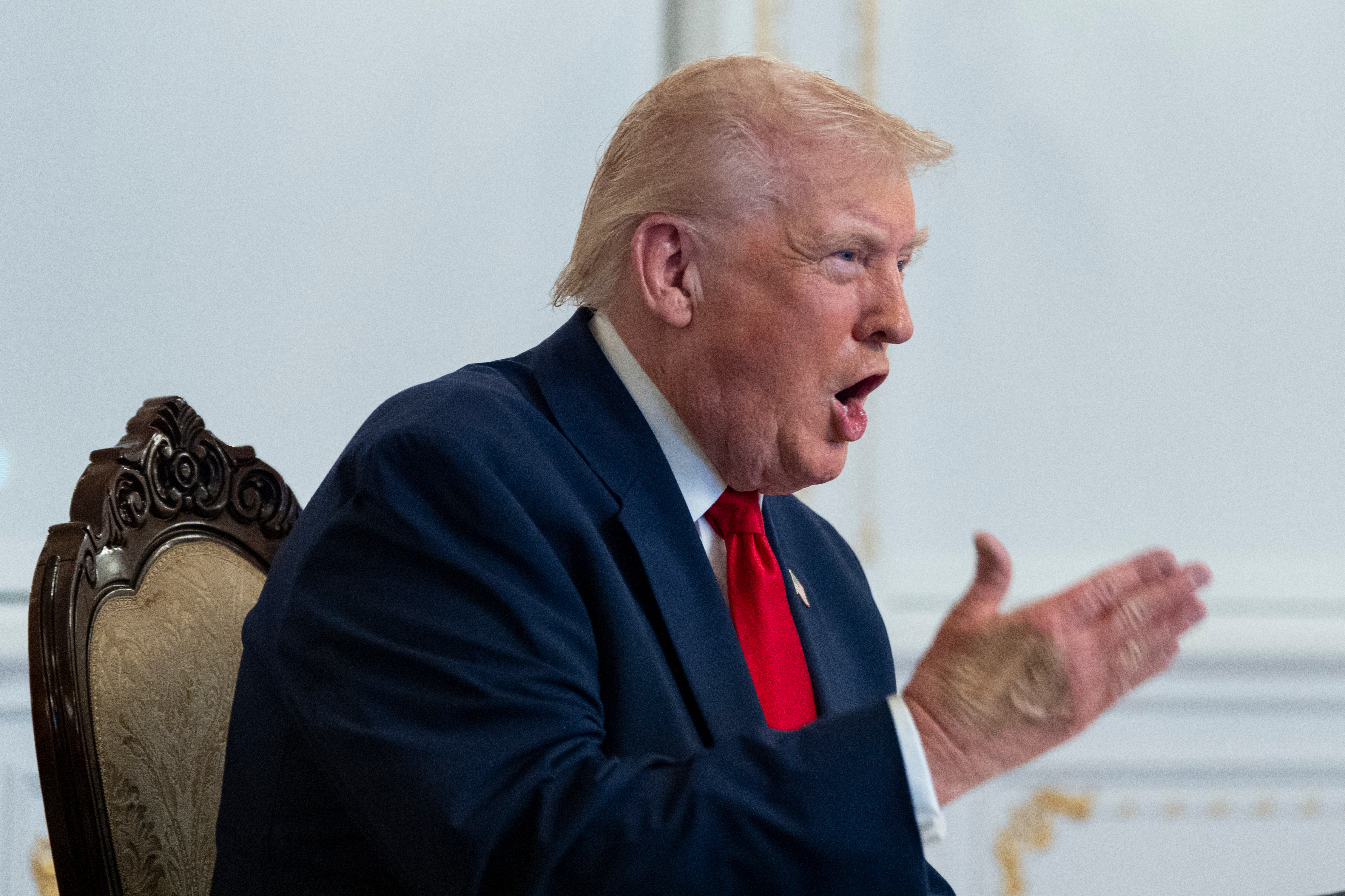 President Donald Trump speaks to troops via video from his Mar-a-Lago estate on Thanksgiving, Thursday, Nov. 27, 2025, in Palm Beach, Fla. (AP Photo/Alex Brandon)