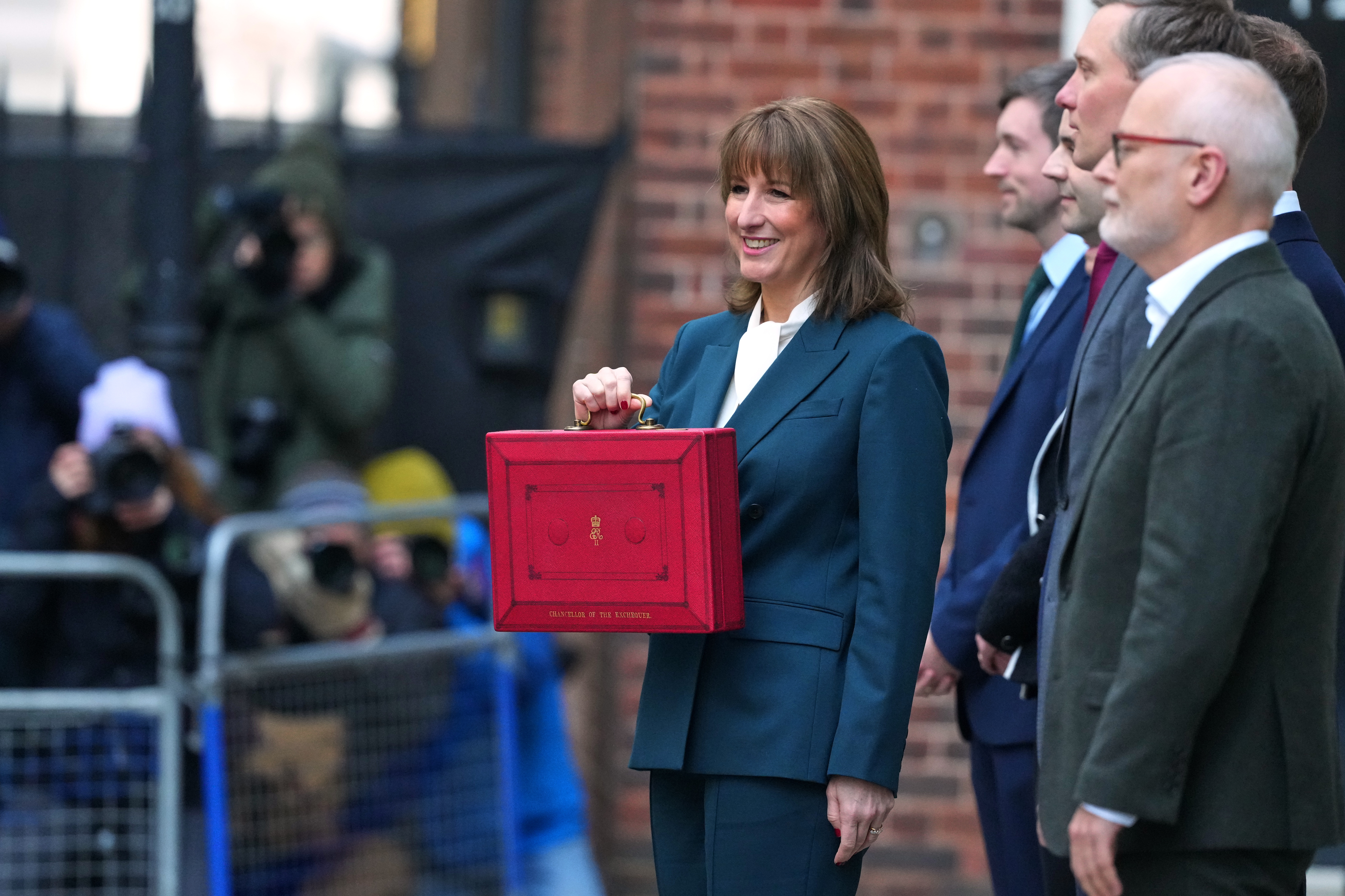 Chancellor of the Exchequer, Rachel Reeves, holds up the red Budget Box as she leaves 11 Downing Street to present the government's annual budget to Parliament