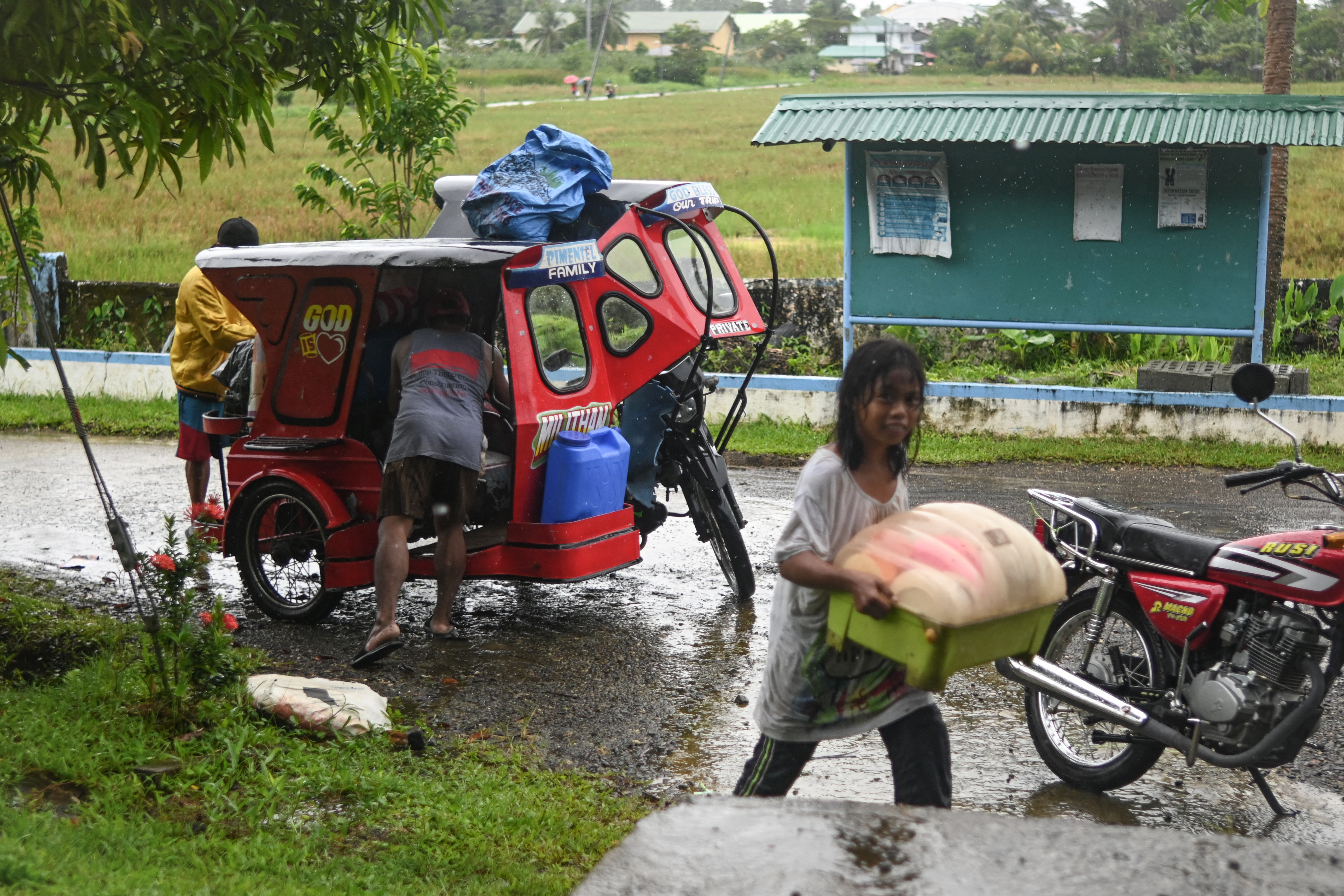 People take shelter at a school as they evacuate in Balangkayan in Eastern Samar on November 3, 2025, ahead of the landfall of Typhoon Kalmaegi.