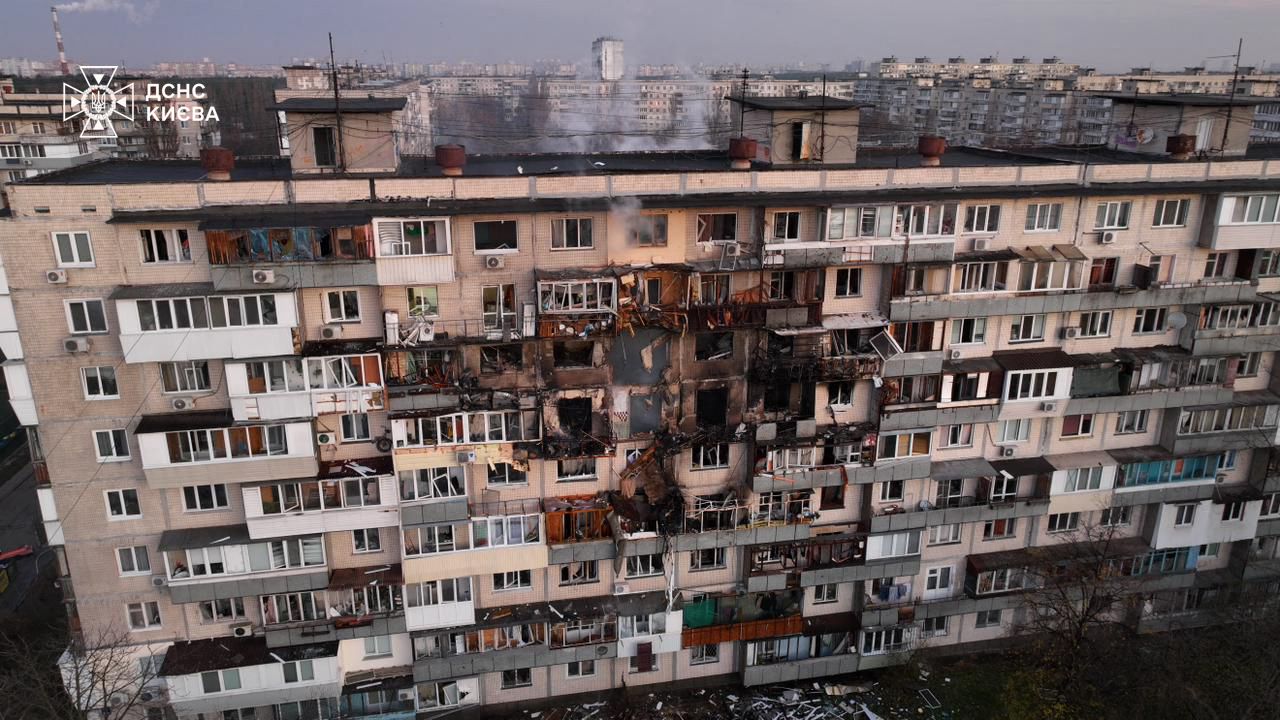 TOPSHOT - This handout photograph taken and released by the Ukrainian Emergency Service on November 14, 2025, shows a damaged residential building following an air strike in Kyiv, amid the Russian invasion of Ukraine.