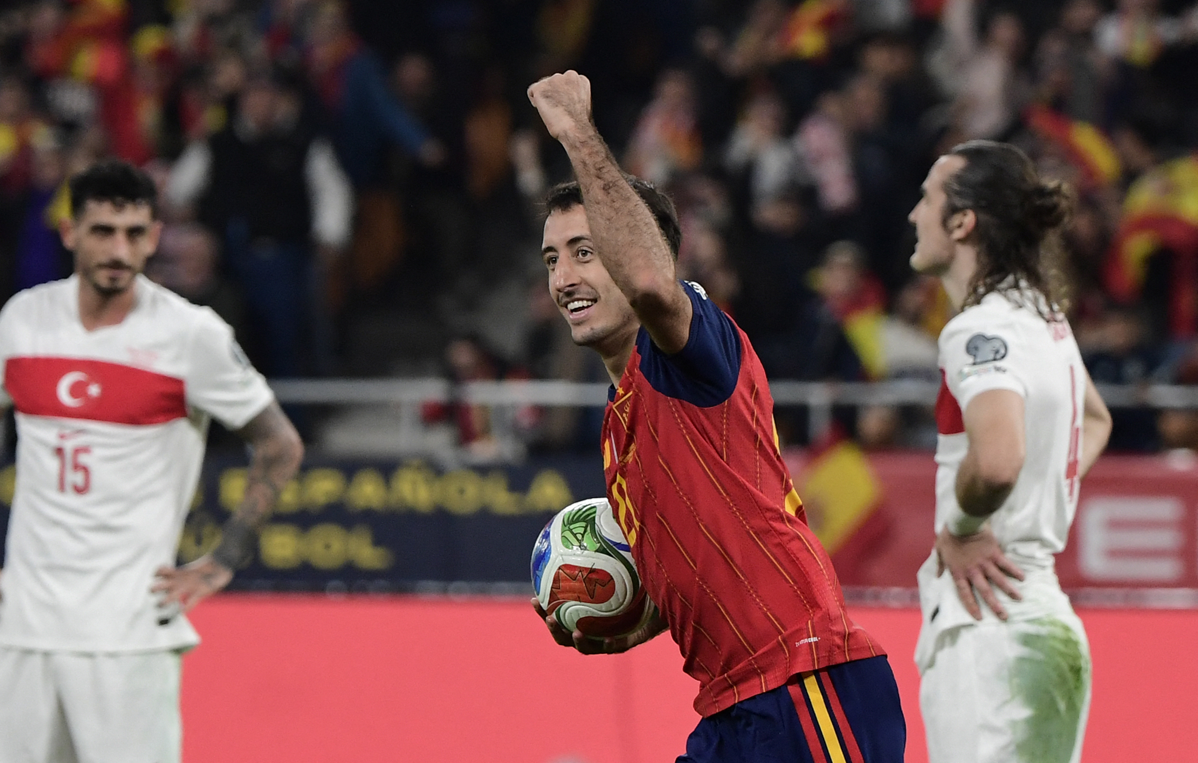 TOPSHOT - Spain's midfielder #21 Mikel Oyarzabal celebrates scoring his team's second goal during the FIFA World Cup 2026 European qualification Group E football match between Spain and Turkey at the Cartuja stadium in Seville on November 18, 2025.