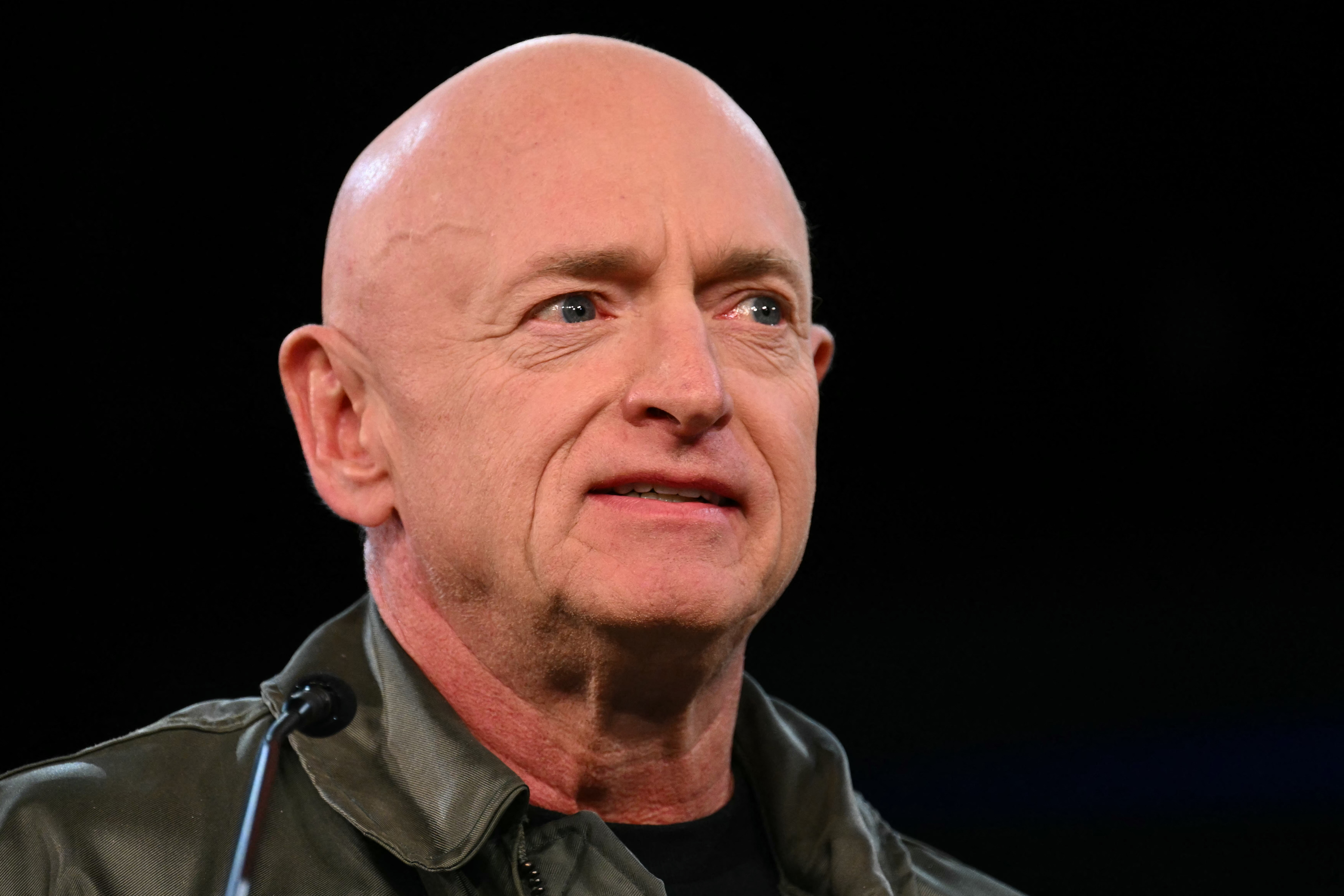 (FILES) US Senator Mark Kelly, Democrat from Arizona, speaks during the Harris-Walz Campaign Election Eve rally and concert at the Celebrity Theater in Phoenix, Arizona, on November 4, 2024.