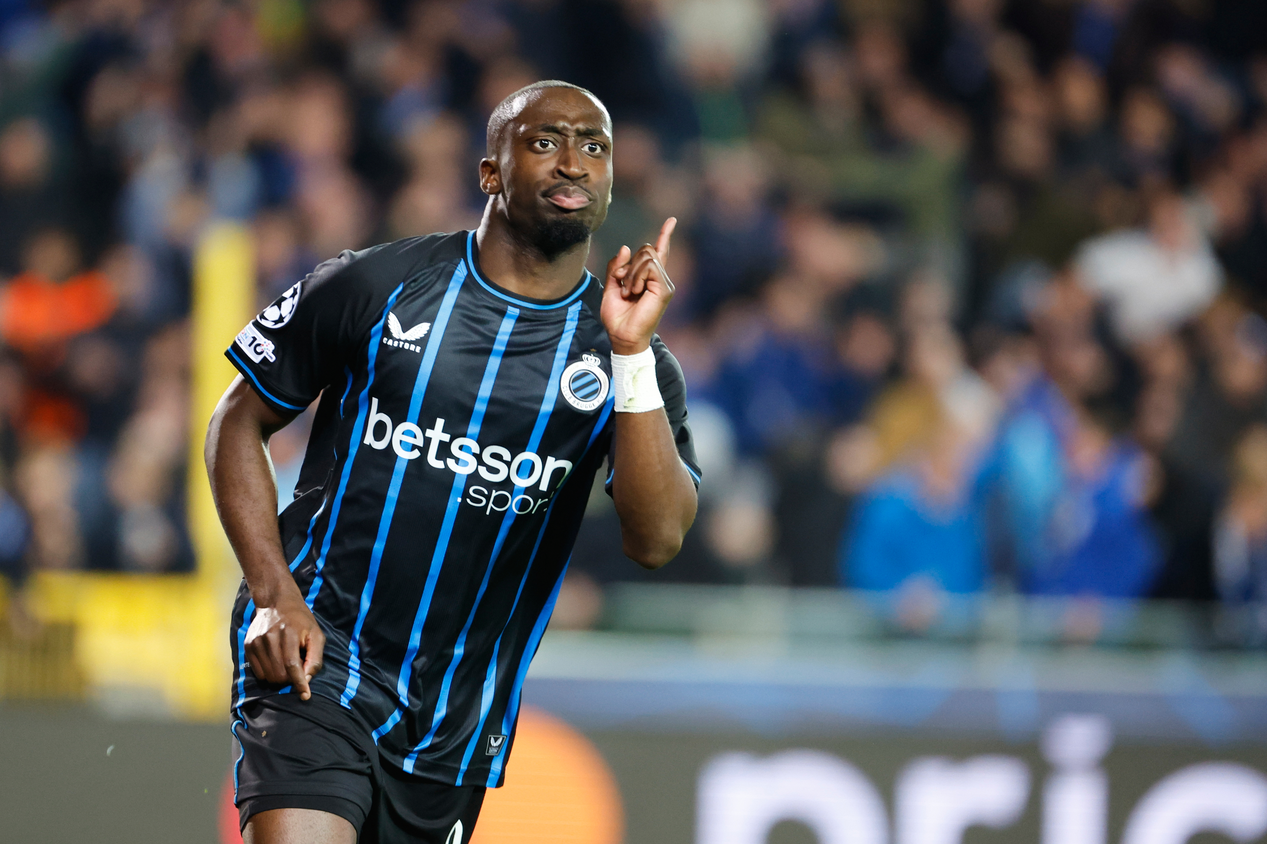 Brugge's Carlos Forbs celebrates after scoring his sides third goal during the Champions League opening phase soccer match between Club Brugge and Barcelona in Bruges, Belgium, Wednesday, Nov. 5, 2025. (AP Photo/Geert Vanden Wijngaert)