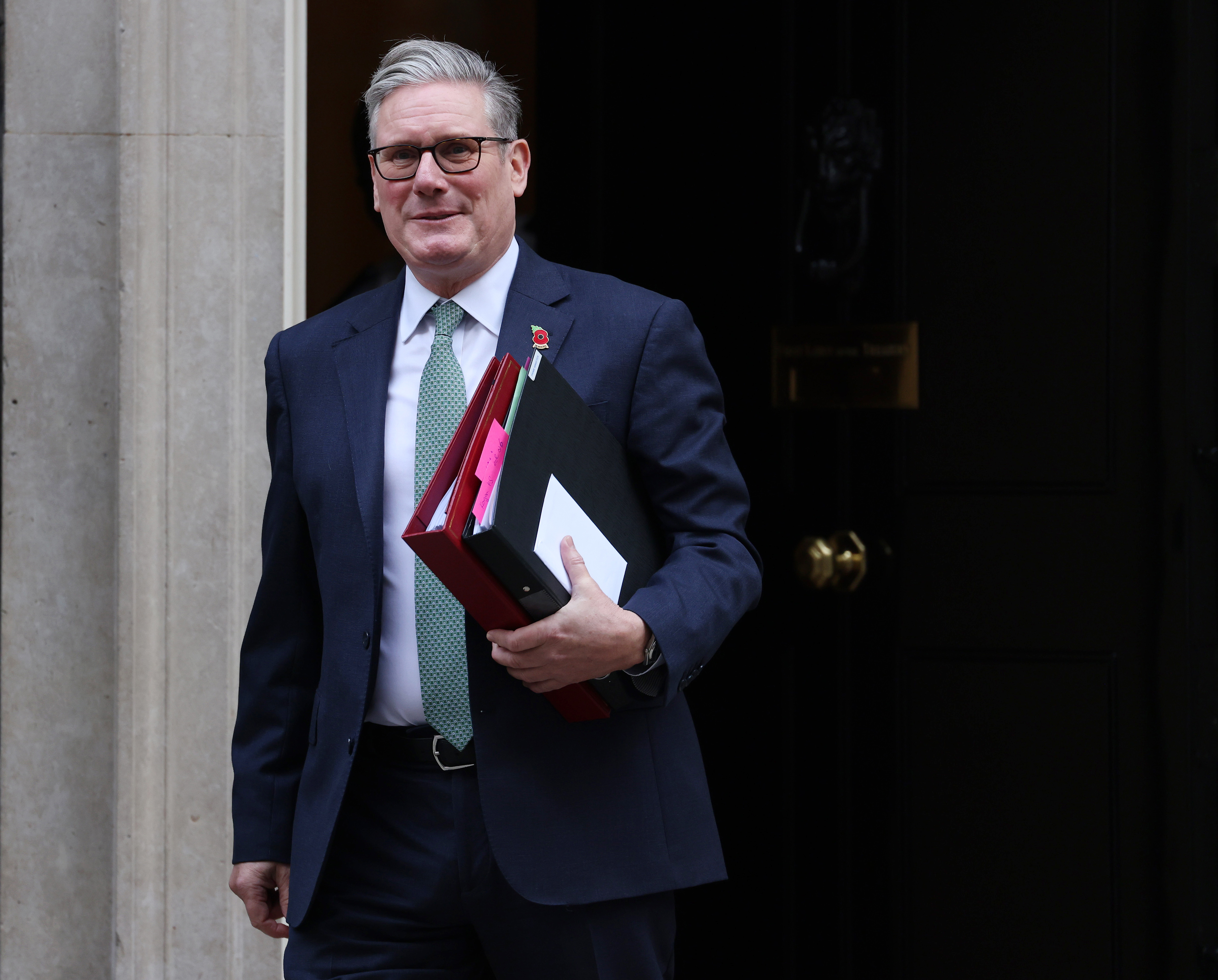 epa12520210 British Prime Minister Sir Keir Starmer departs 10 Downing Street for Prime Minister's Questions at parliament in London, Britain, 12 November 2025. EPA/ANDY RAIN