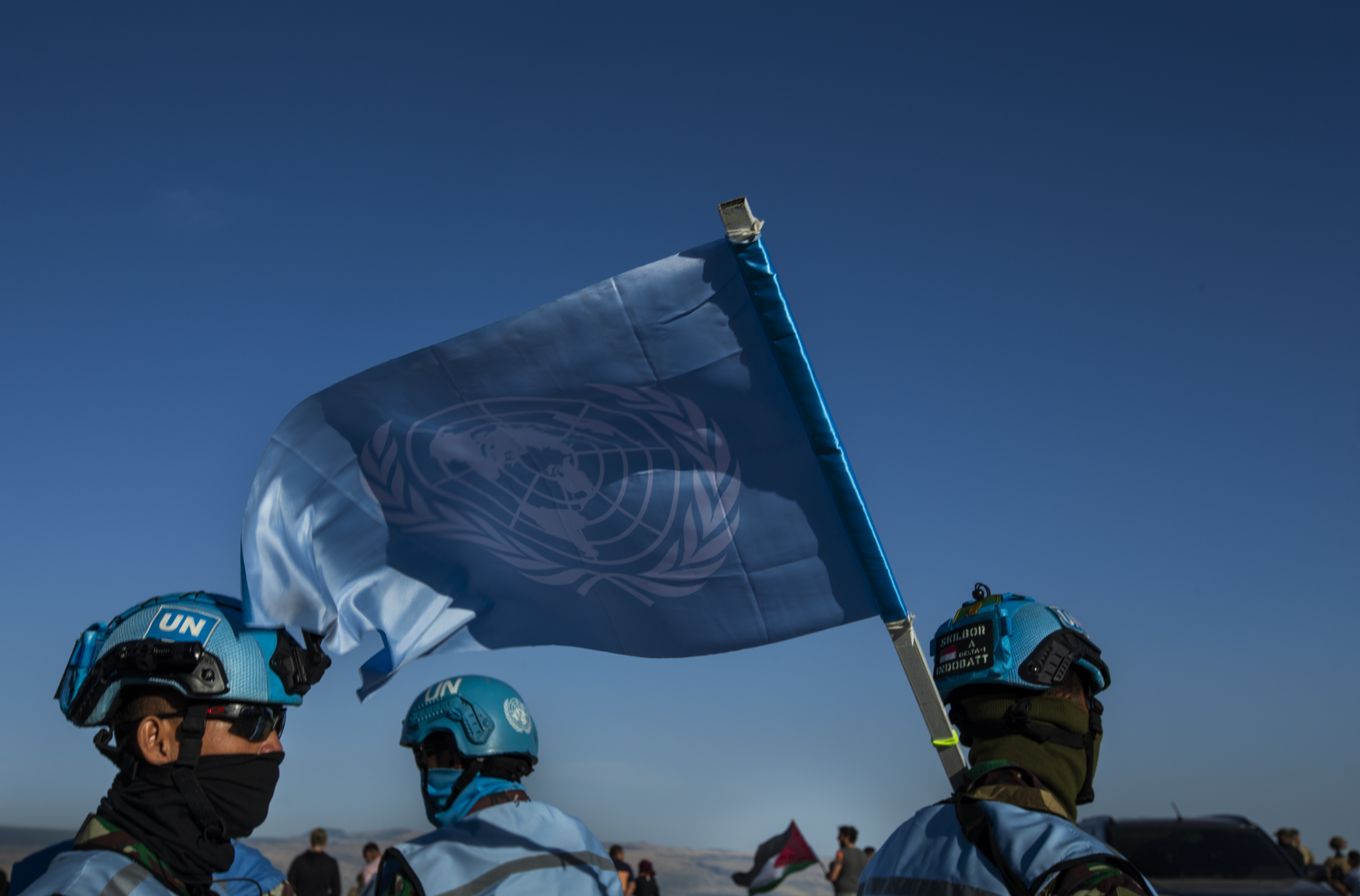 ADAISSEH, LEBANON - MAY 16: United Nations peacekeeping force in Lebanon (UNIFIL) soldiers monitor a demonstration to show solidarity with Palestinians as near the Lebanon-Israel border on May 16, 2021 in Adaisseh, Lebanon. Gun shots were heard from the Israeli side, but not injuries were reported. (Photo by Daniel Carde/Getty Images)