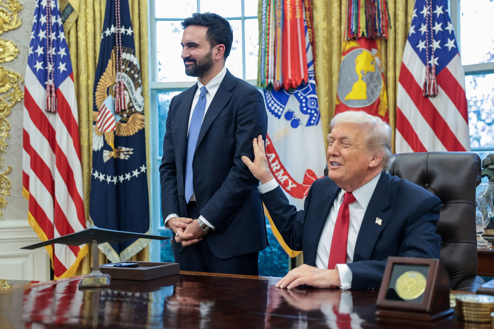 US President Donald Trump and New York City Mayor-elect Zohran Mamdani speak to members of the media as they meet in the Oval Office at the White House in Washington, D.C., on Nov. 21, 2025. [Jonathan Ernst/Reuters]