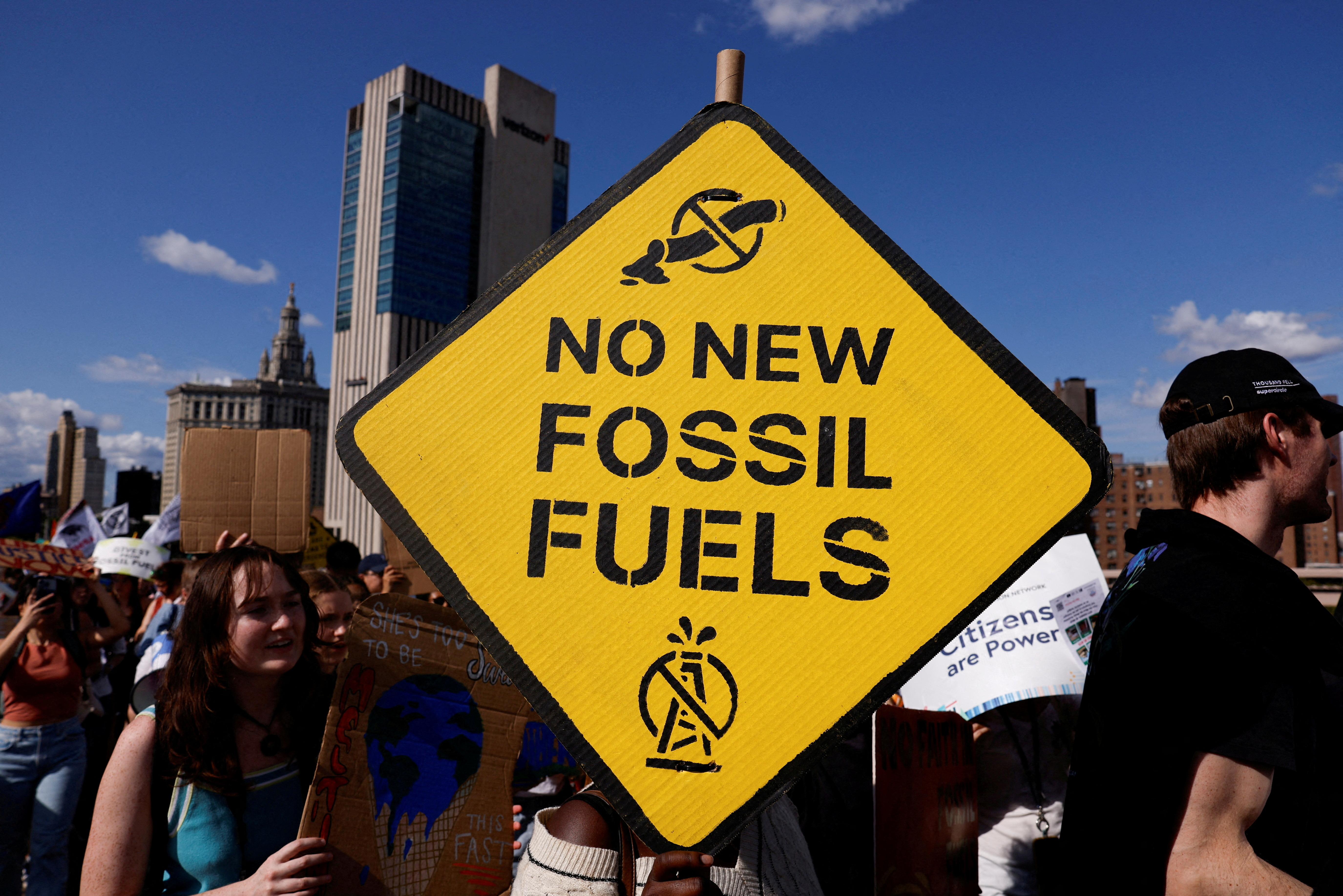 FILE PHOTO: Demonstrators march across Brooklyn Bridge rallying to call to an end to the era of fossil fuels, as part of global day of action on 9/20 calling on Polluters, Funders, and Leaders to ditch fossil fuels, from Foley Square in New York City, U.S. September 20, 2024. REUTERS/Shannon Stapleton/File Photo