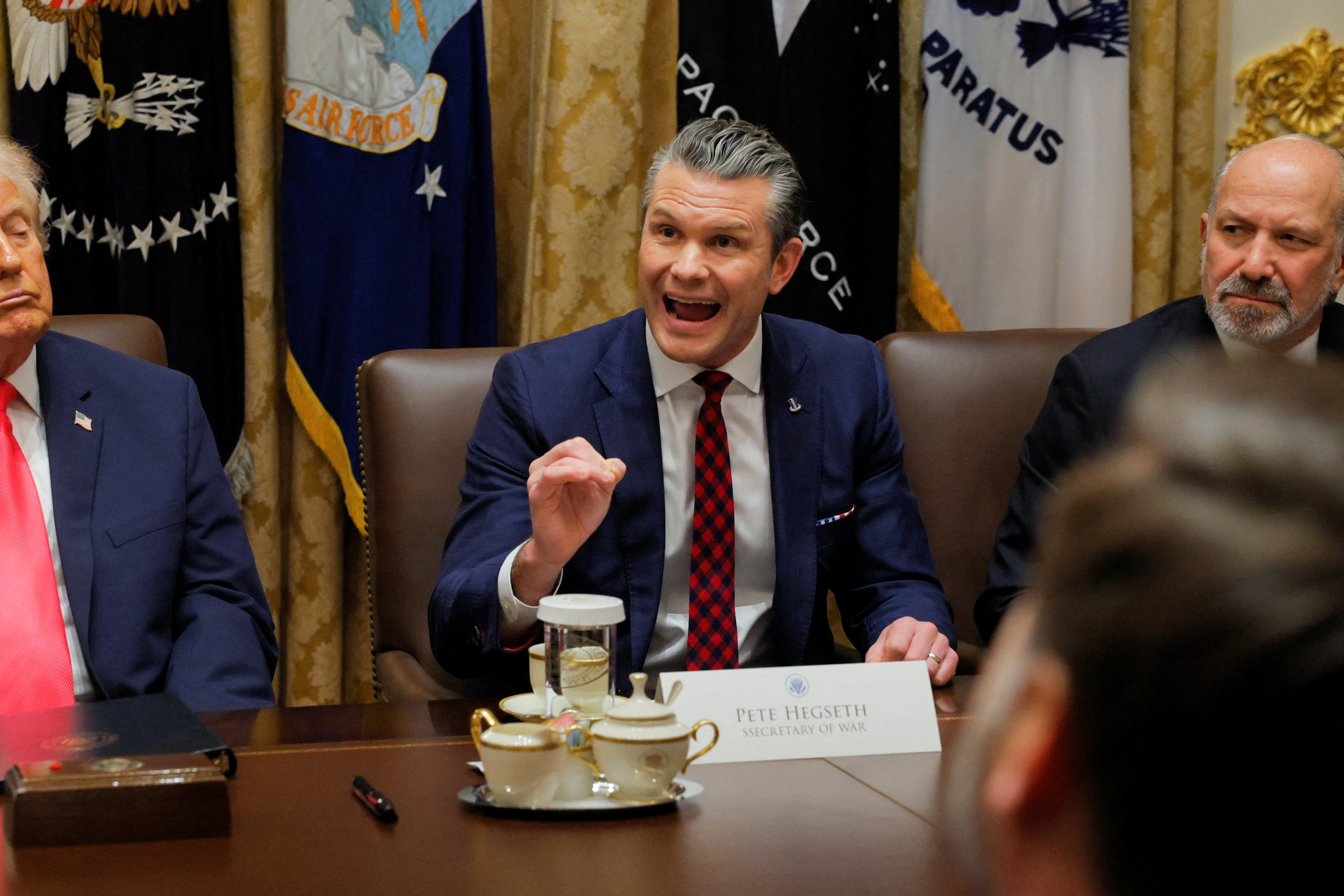 U.S. Secretary of Defense Pete Hegseth speaks during a cabinet meeting with U.S. President Donald Trump, at the White House in Washington, D.C., U.S., December 2, 2025. [Brian Snyder/Reuters]