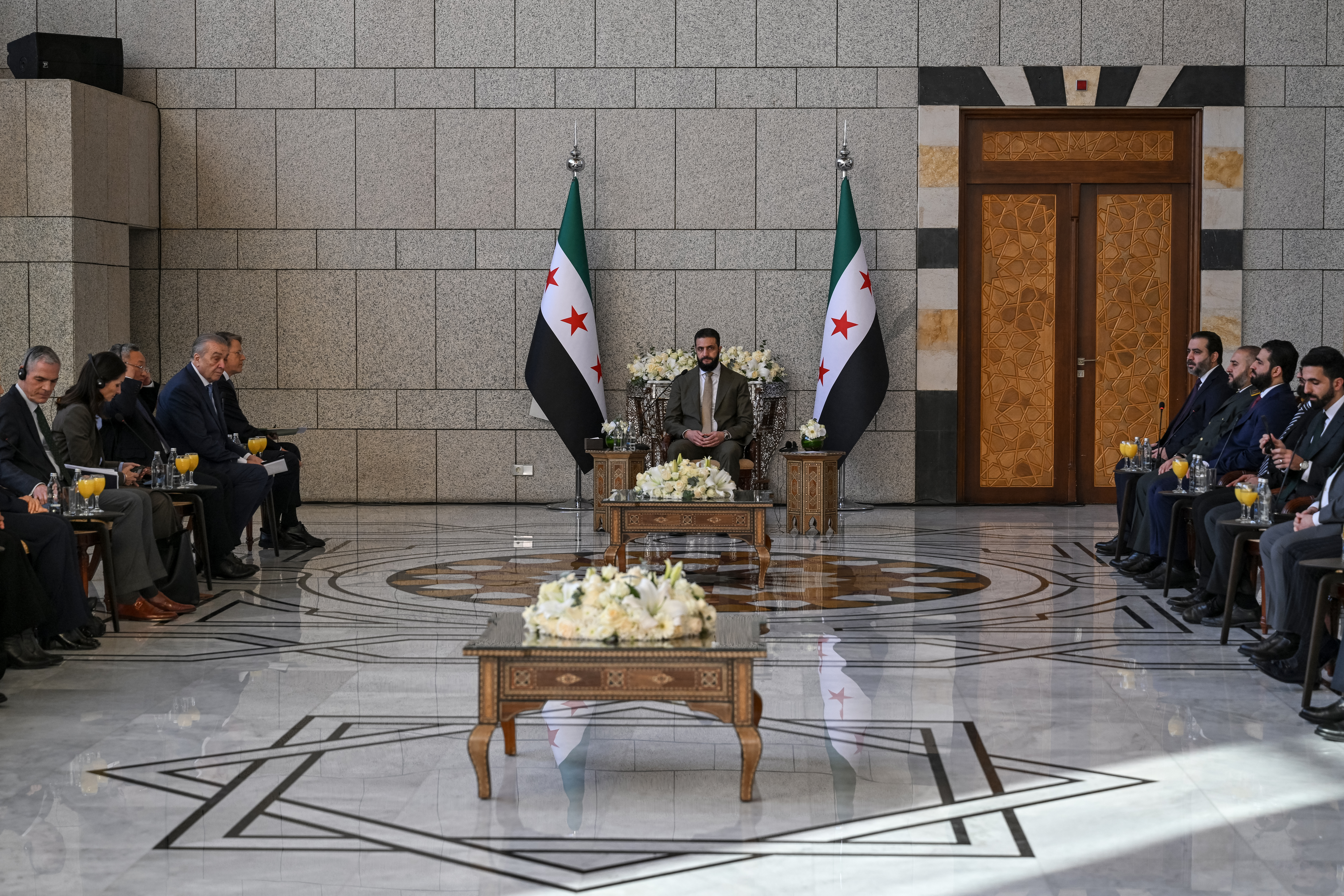 Syrian President Ahmed al-Sharaa attends a reception with a UN Security Council delegation in Damascus