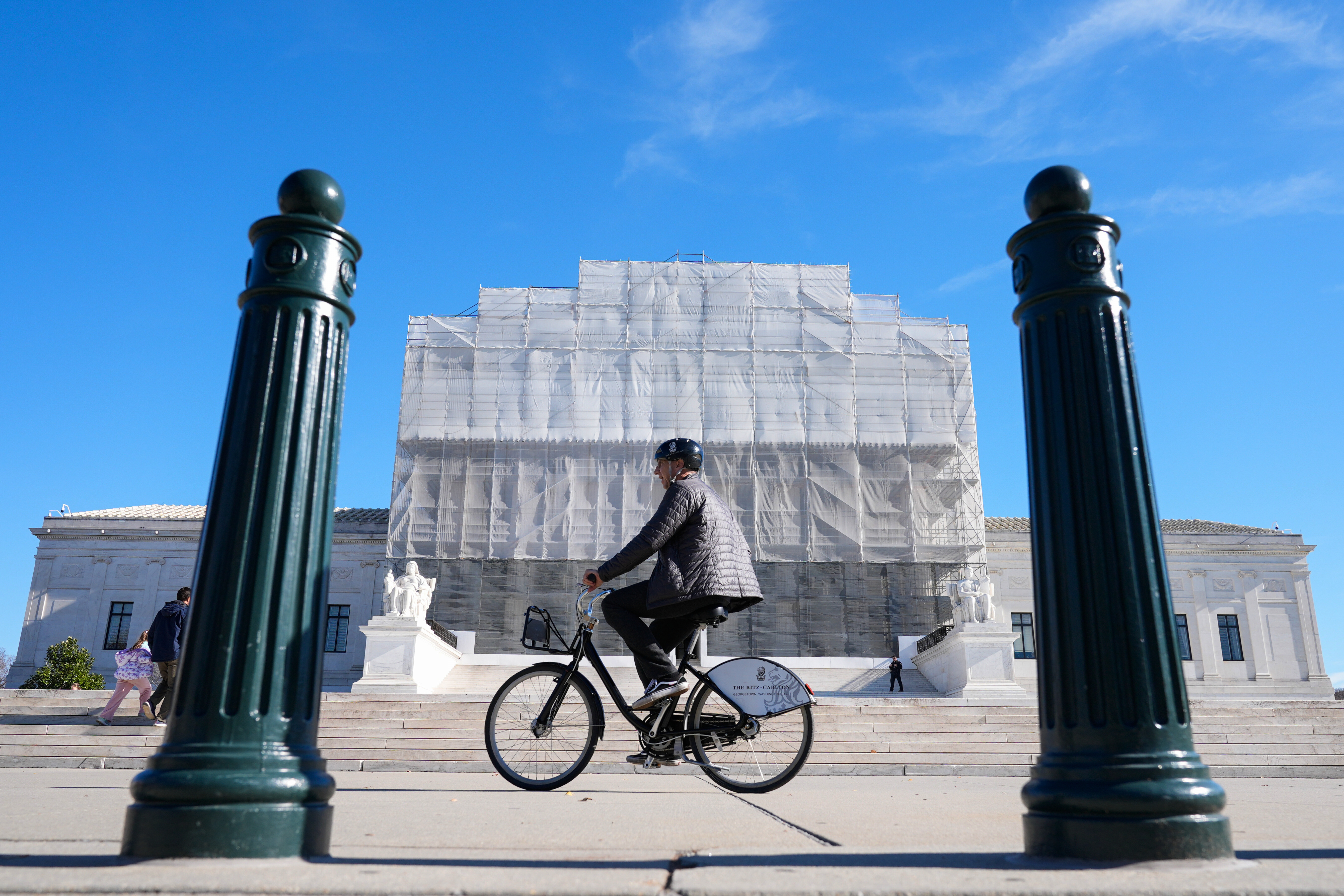 A bike rides by the US Supreme Court