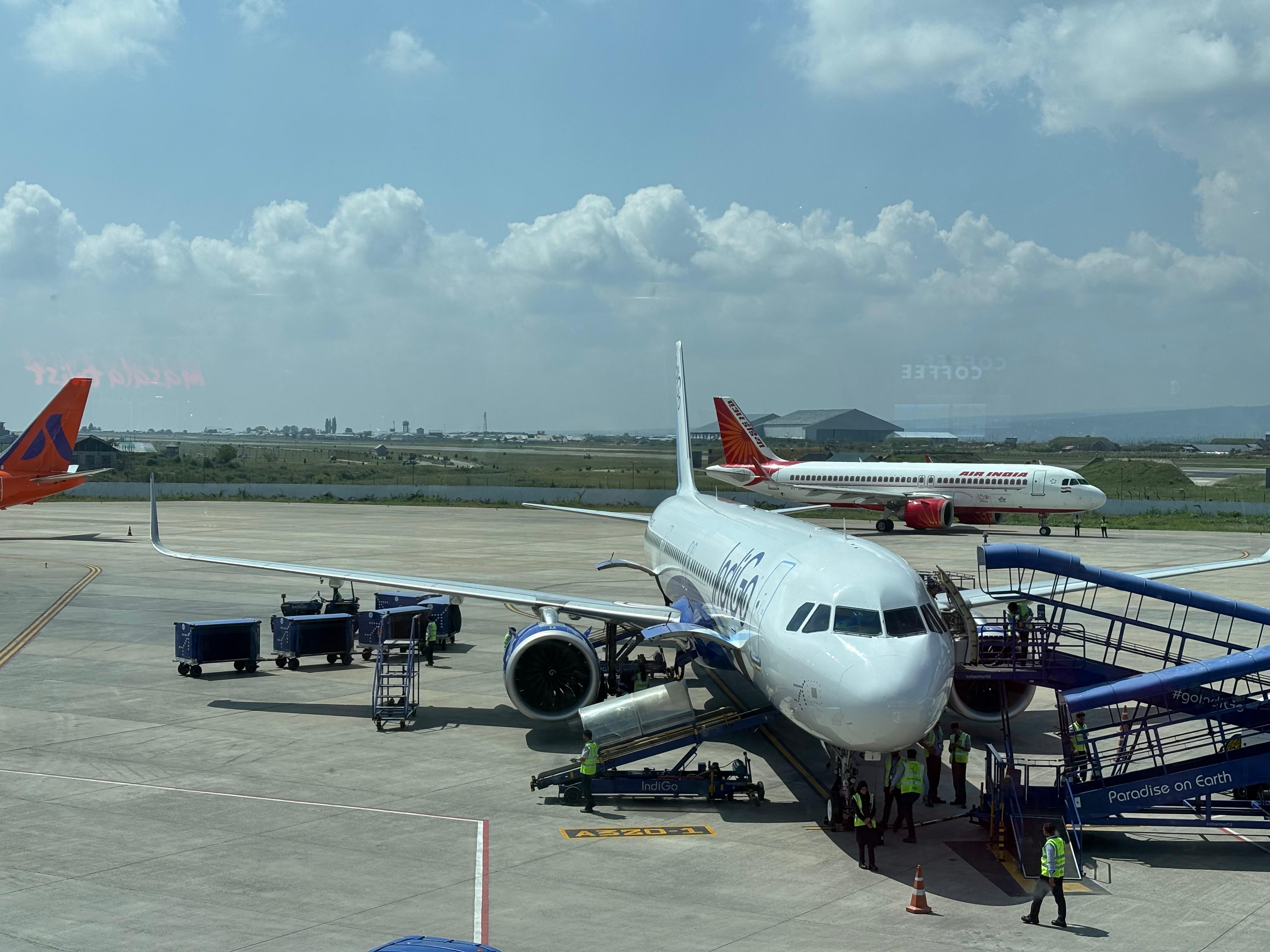 An Indigo flight on the tarmac at the airport in Srinagar, Indian-administered Kashmir [File: Aatif Ammad]