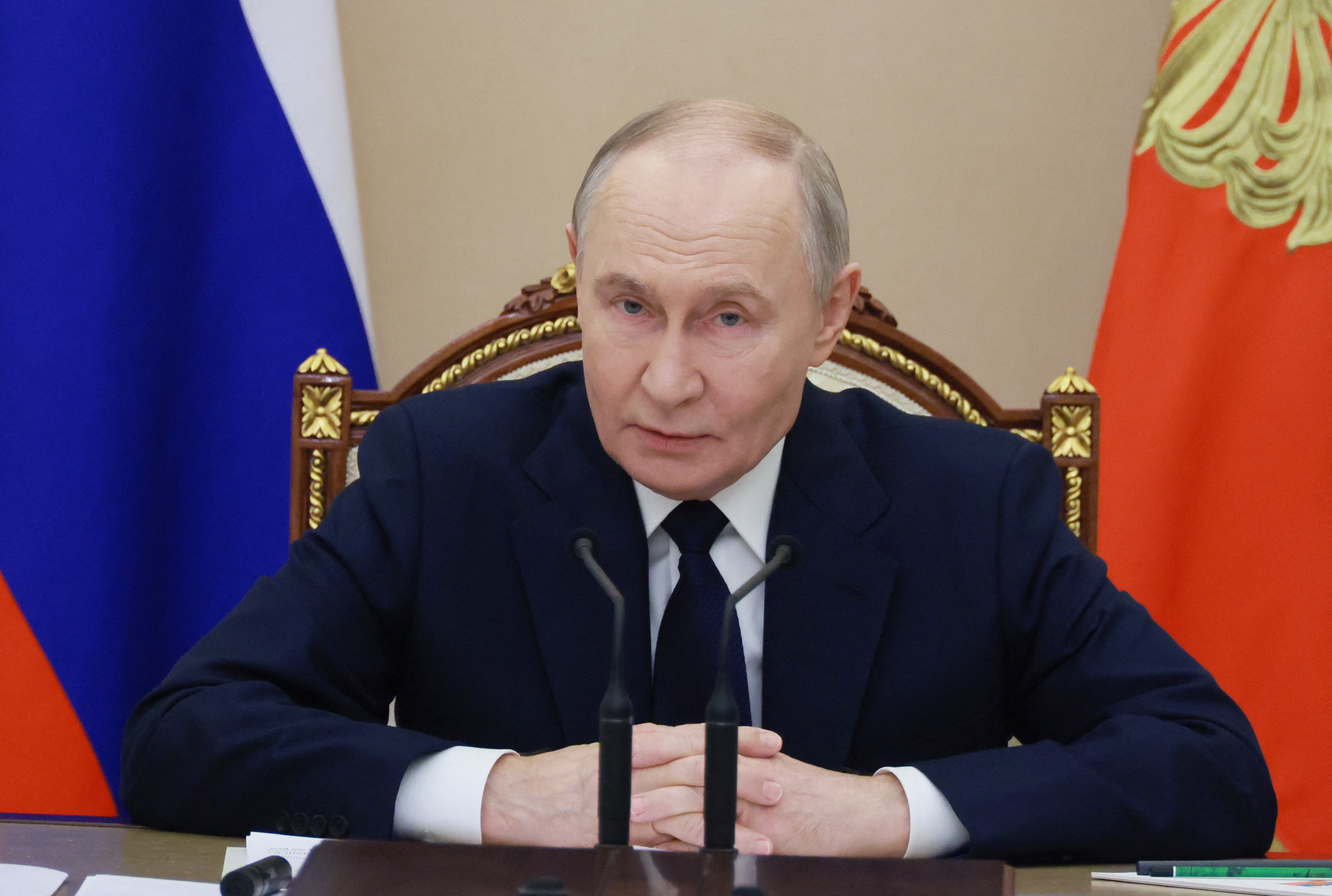 In this pool photograph distributed by the Russian state agency Sputnik, Russia's President Vladimir Putin chairs a meeting on situation in the zone of the "special military operation", the Kremlin's term for the nearly four-year-long Ukraine offensive, in Moscow on December 29, 2025. (Photo by Mikhail METZEL / POOL / AFP)