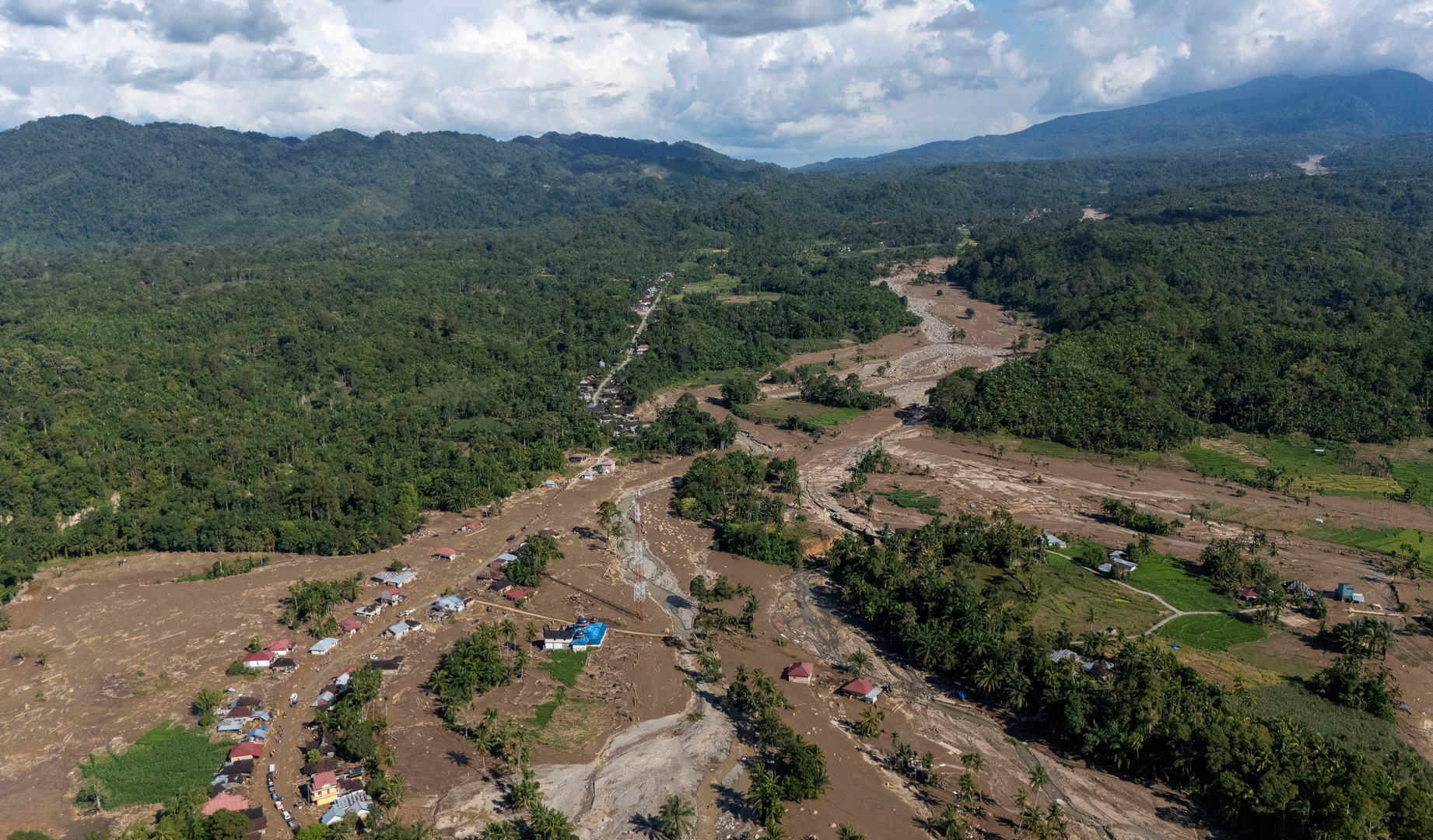 A drone view of an area hit by deadly flash floods following heavy rains in Palembayan, Agam regency, West Sumatra province, Indonesia on Dec. 1, 2025. [Willy Kurniawan/Reuters]