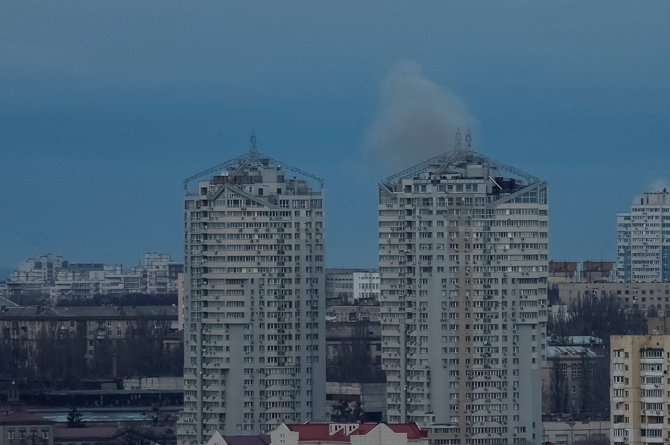 Smoke rises in the city after Russian drone and missile strikes, amid Russia's attack on Ukraine, in Kyiv, Ukraine December 23, 2025. REUTERS/Gleb Garanich