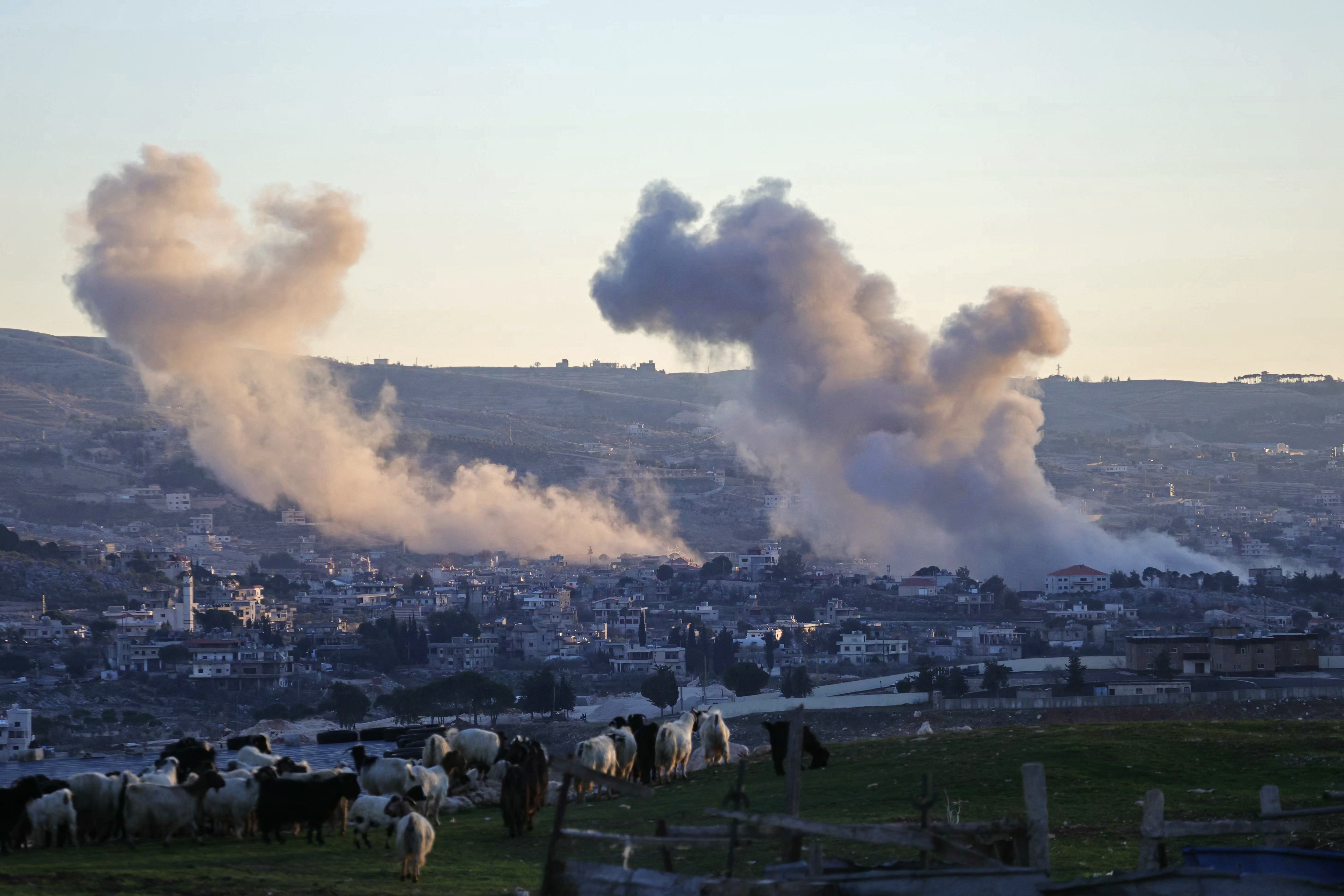 TOPSHOT - Smoke rises from the site of an Israeli airstrike that targeted the village of Sohmor, in southern Lebanon on January 15, 2026.