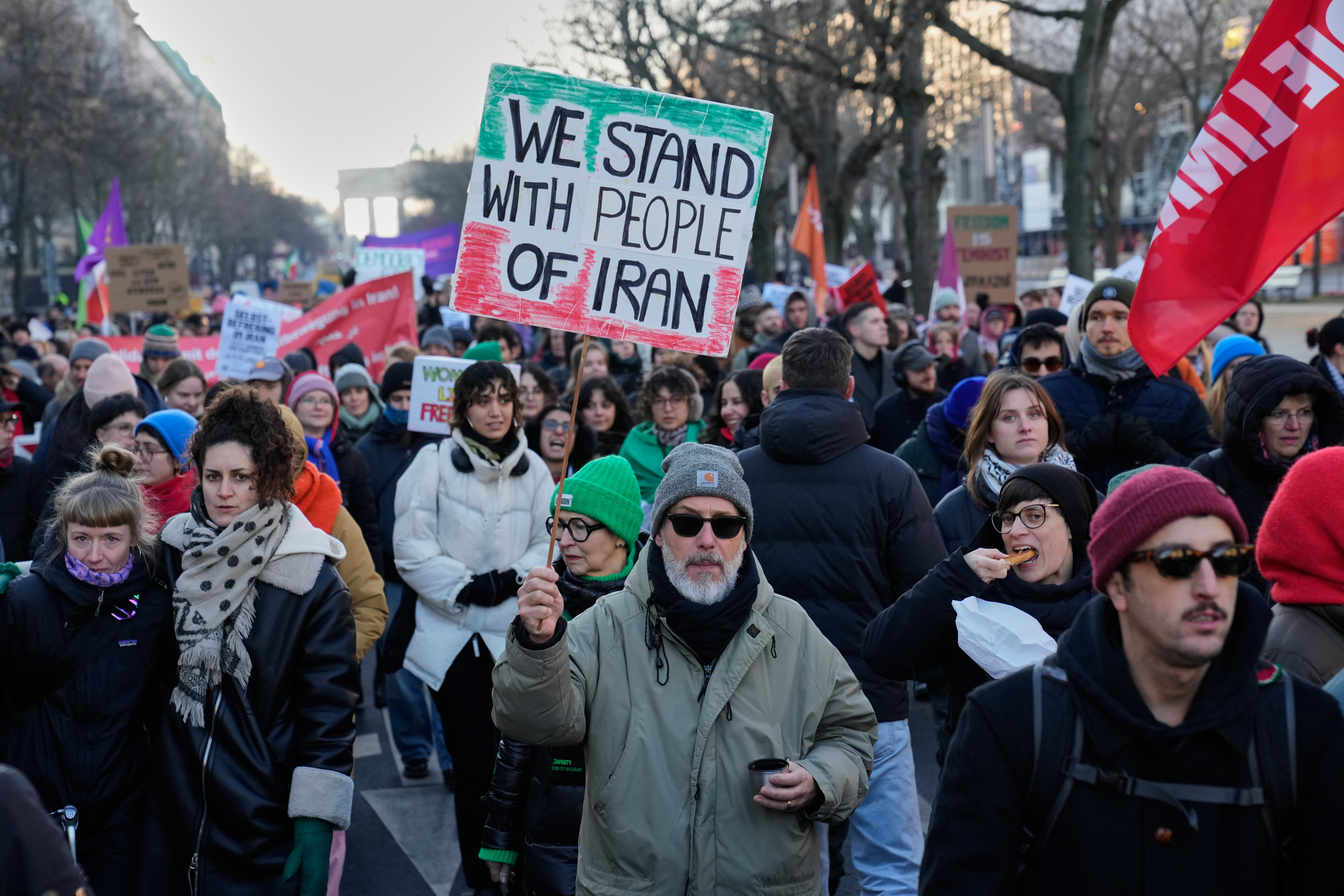 Protesters participate in a demonstration in support of the nationwide mass protests in Iran against the government, in Berlin, Germany, Sunday, Jan. 18, 2026. (AP Photo/Ebrahim Noroozi)