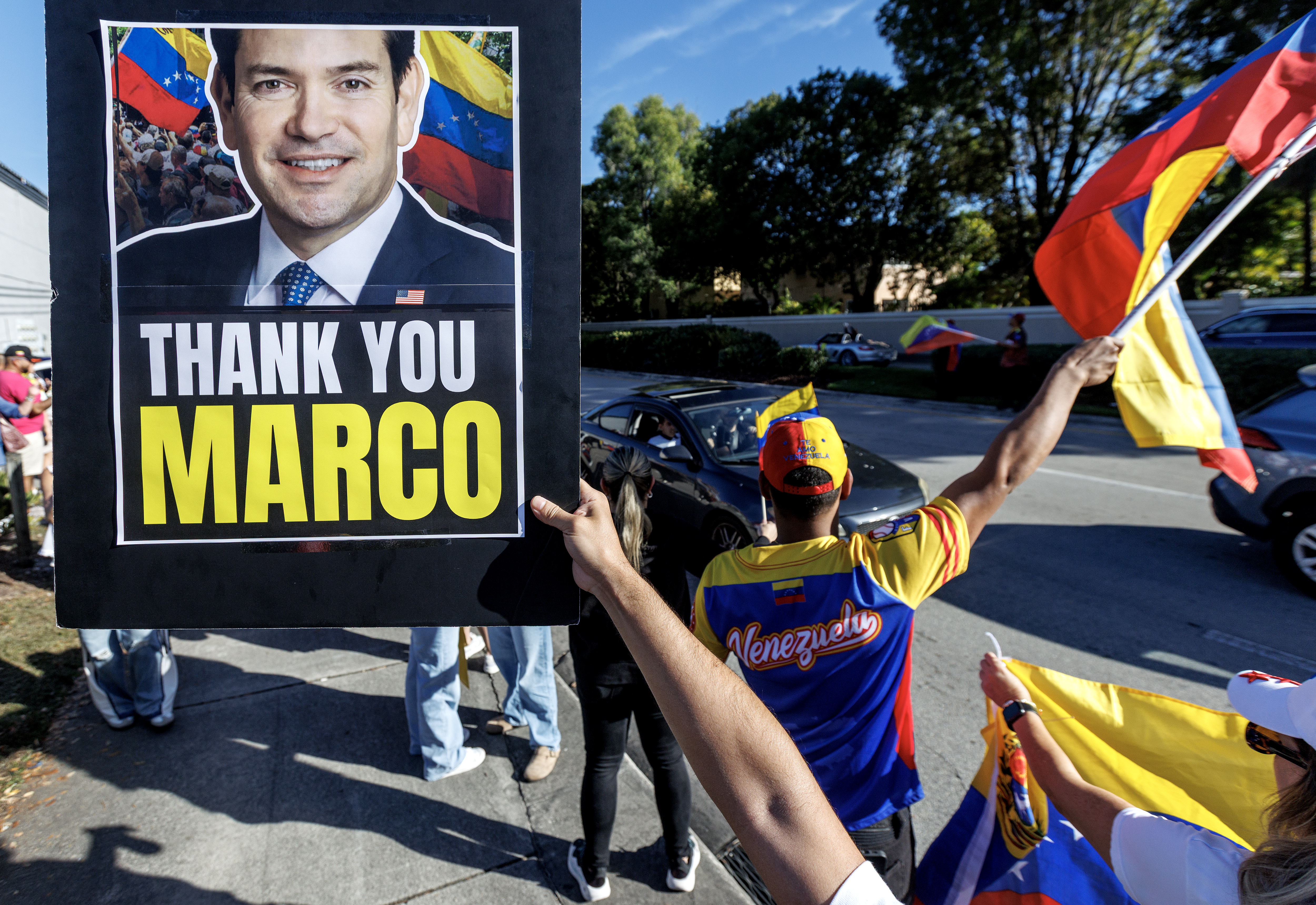 epaselect epa12624353 Venezuelans in Miami hold a picture of US Secretary of State Marco Rubio while taking part in a rally in response to the US military strikes in Venezuela, Miami, Florida, USA, 03 January 2026. President Trump announced that US forces have successfully captured Venezuelan President Nicolas Maduro and his wife during a series of large-scale strikes on Caracas on 03 January 2026. EPA/CRISTOBAL HERRERA-ULASHKEVICH