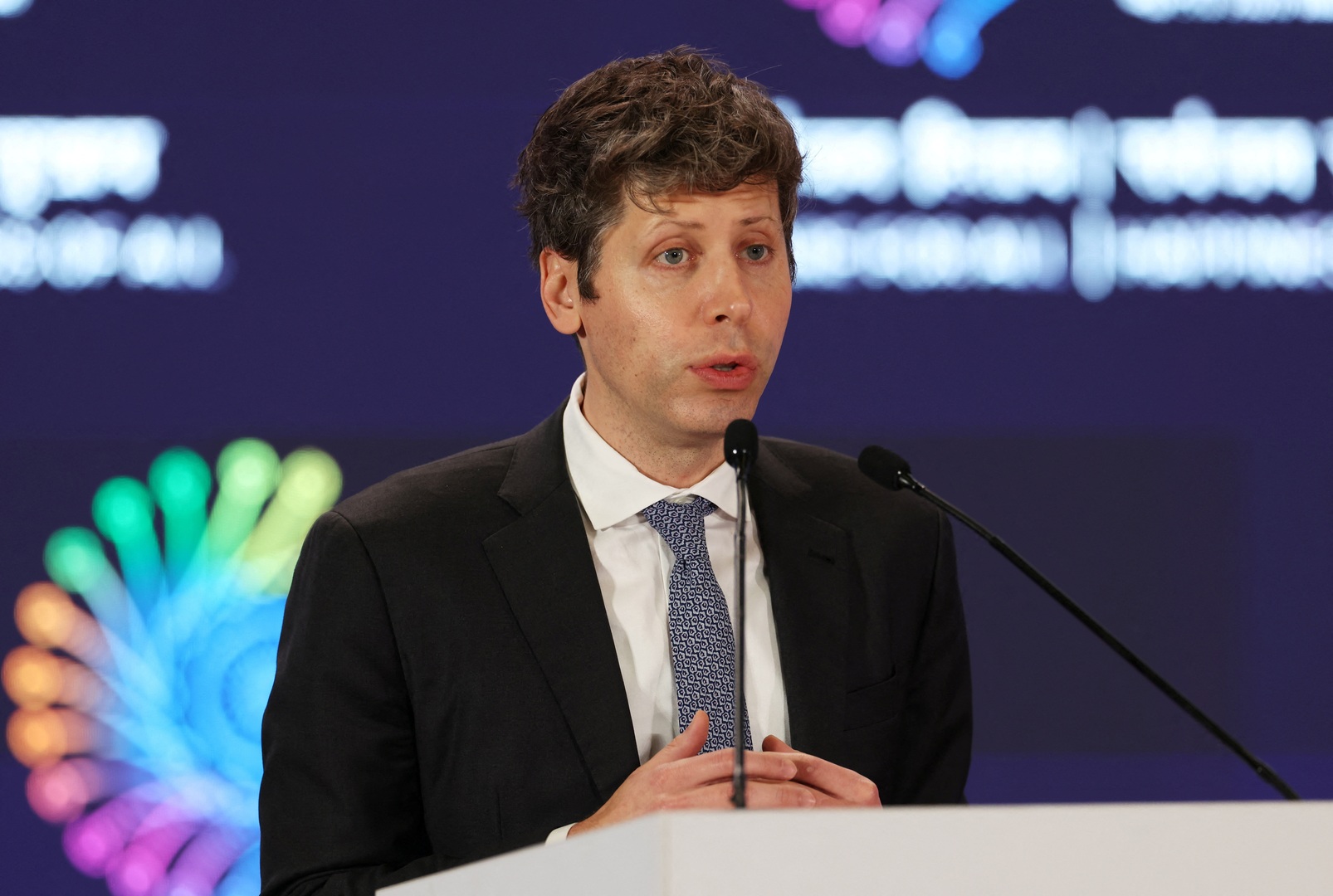 OpenAI CEO Sam Altman addresses the gathering at the AI Impact Summit, in New Delhi, India on Feb. 19, 2026. [Bhawika Chhabra/Reuters]