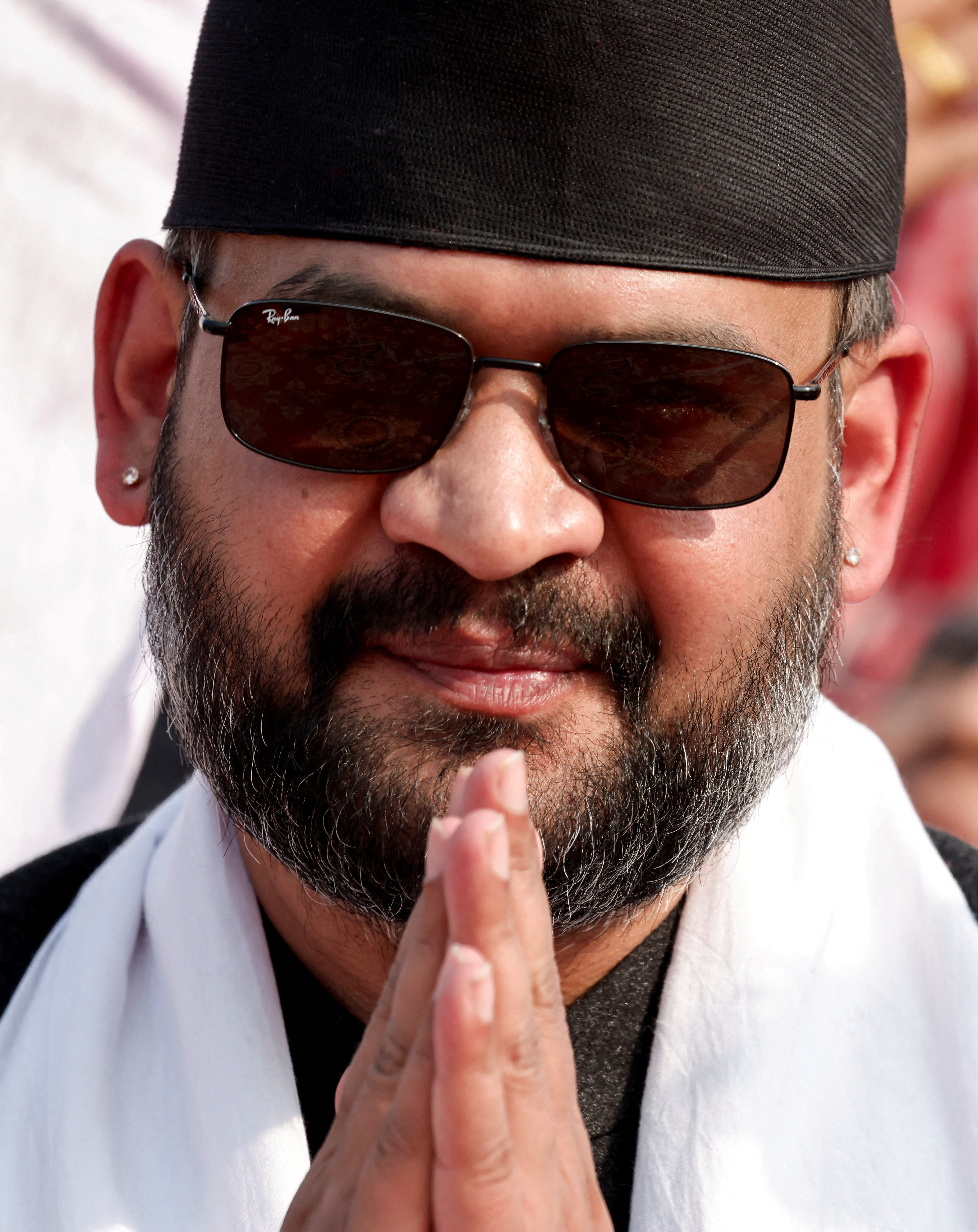 FILE PHOTO: Balendra Shah, former mayor of Kathmandu popularly known as "Balen", who according to party officials, will become prime minister under an internal agreement if the Rastriya Swatantra Party (RSP) wins the March 5 elections, gestures as he greets his supporters during an election campaign in Janakpur, Nepal, January 19, 2026. REUTERS/Navesh Chitrakar/File Photo