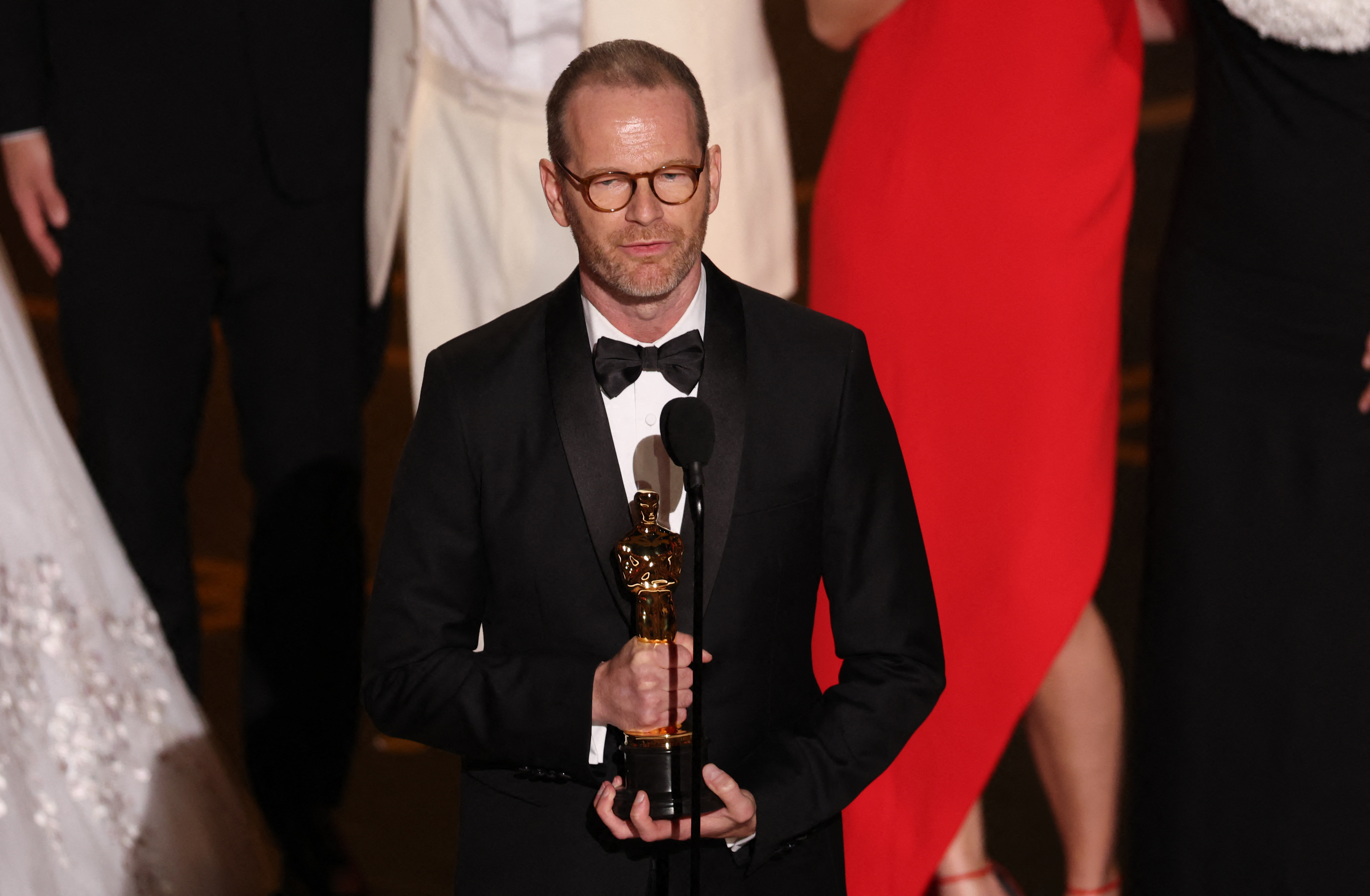 Danish-Norwegian film director and writer Joachim Trier accepts the award for Best International Feature Film for "Sentimental Value" onstage during the 98th Annual Academy Awards at the Dolby Theatre in Hollywood, California on March 15, 2026. (Photo by Patrick T. Fallon / AFP)