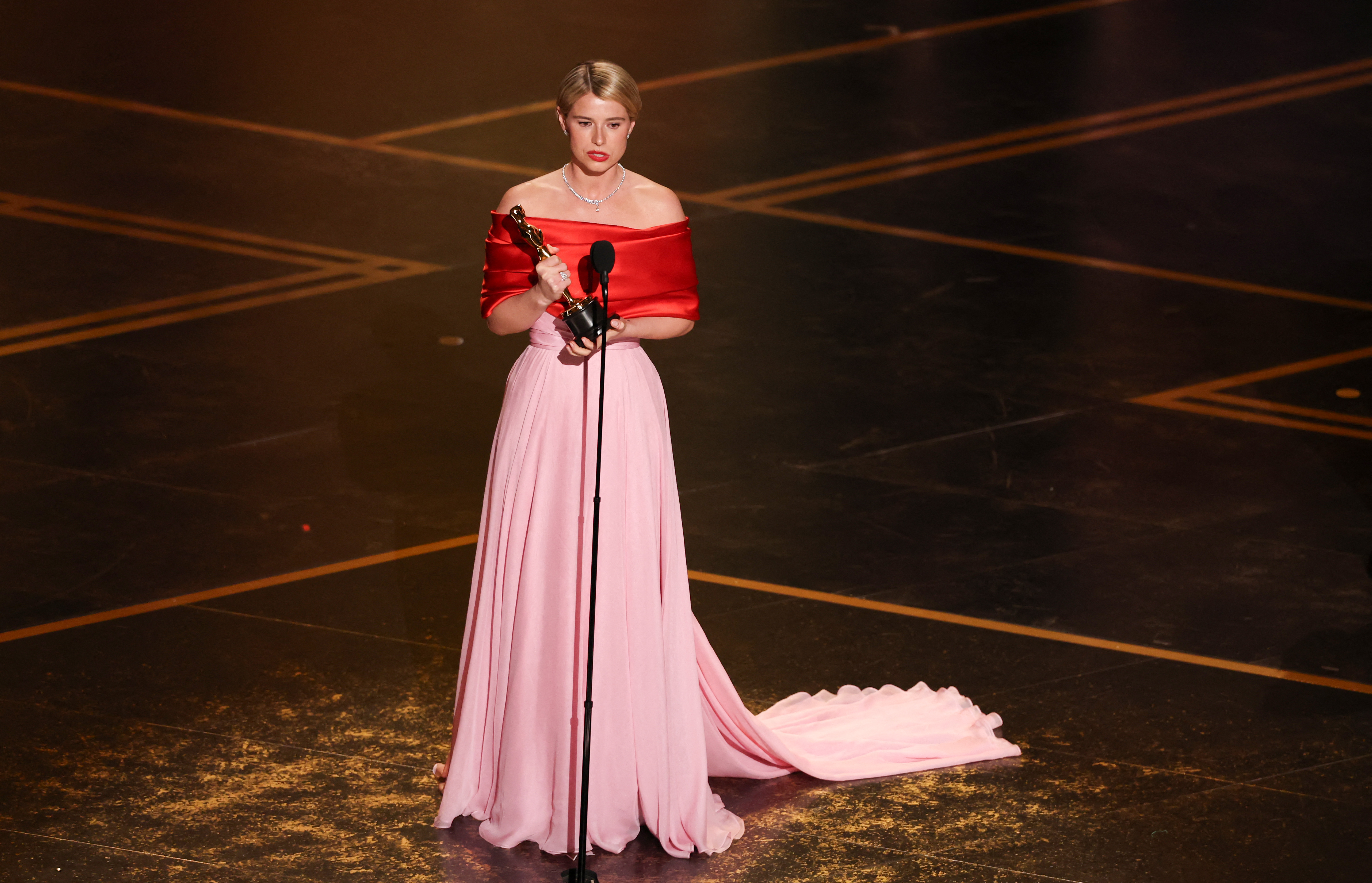 Irish actress Jessie Buckley accepts the award for Best Actress in a Leading Role for "Hamnet" onstage during the 98th Annual Academy Awards at the Dolby Theatre in Hollywood, California on March 15, 2026. (Photo by Patrick T. Fallon / AFP)