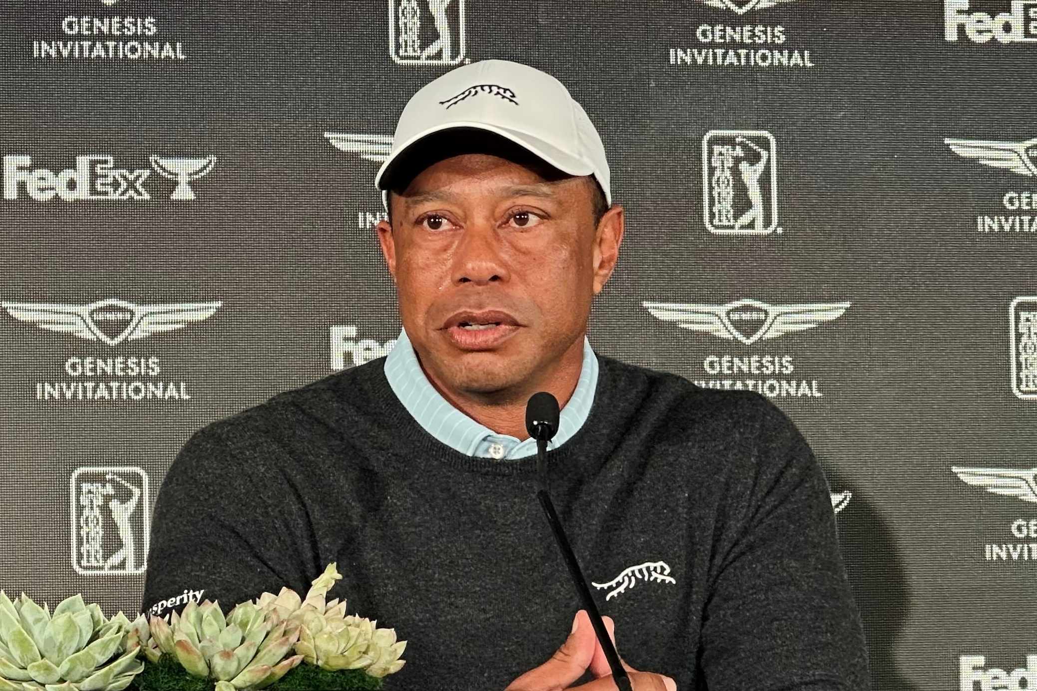 Tiger Woods reacts