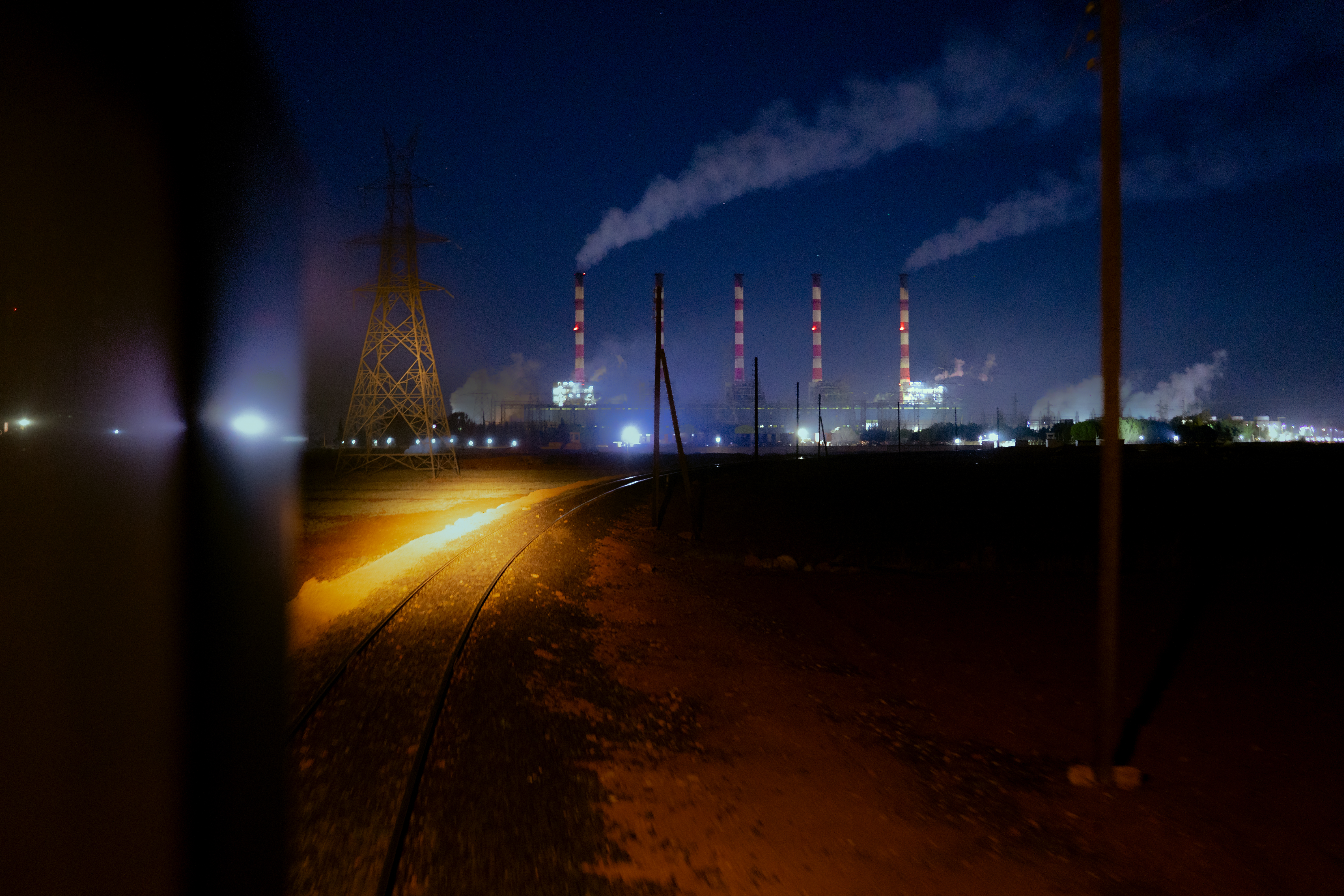 The Aleppo Thermal Power Plant, located to the east of the city, comes into view from the train [Charles Cuau/Al Jazeera]