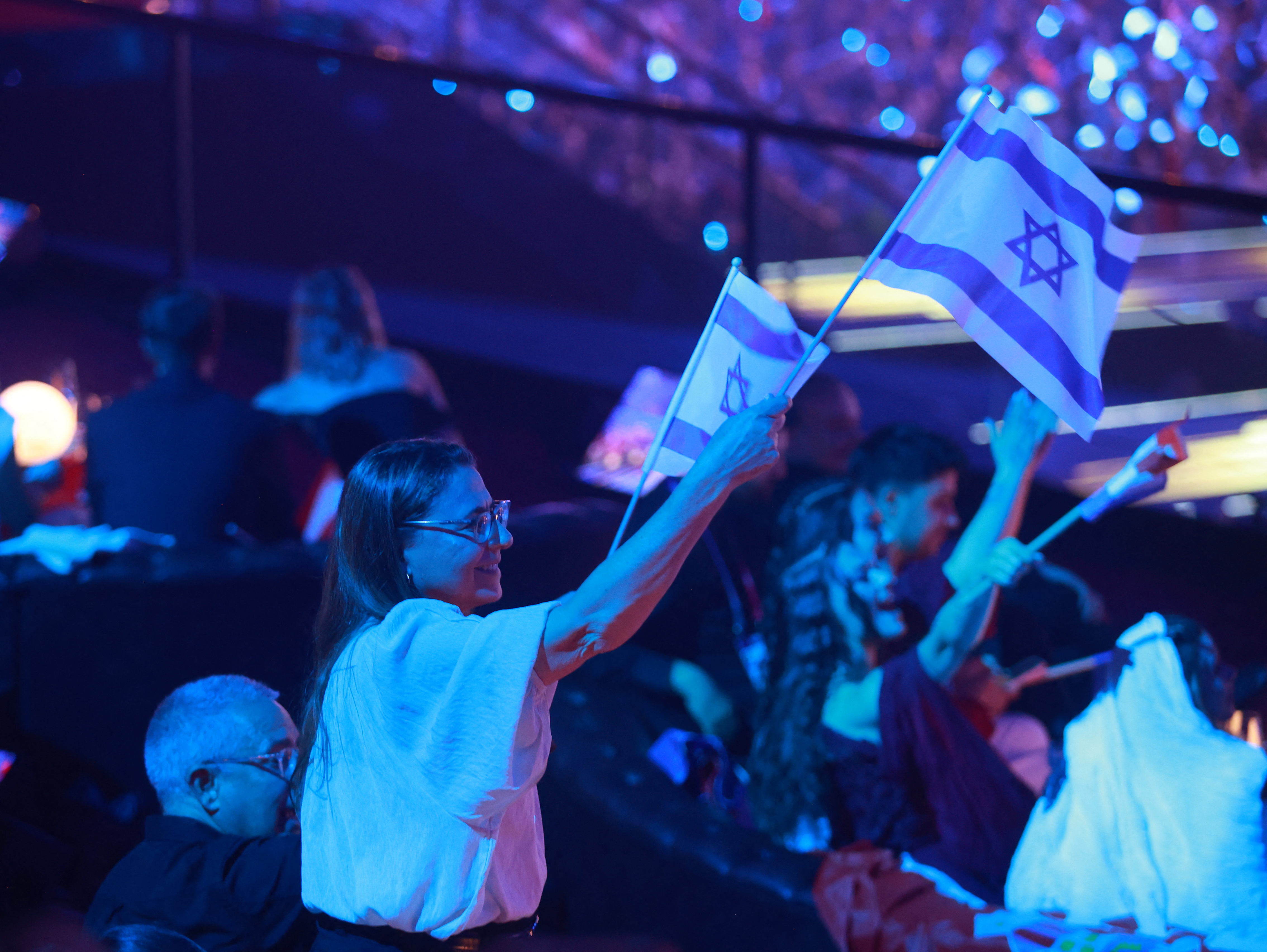 Supporters wave Israeli flags during the final of the Eurovision Song Contest 2026 (ESC) at Wiener Stadthalle in Vienna, Austria on May 16, 2026.