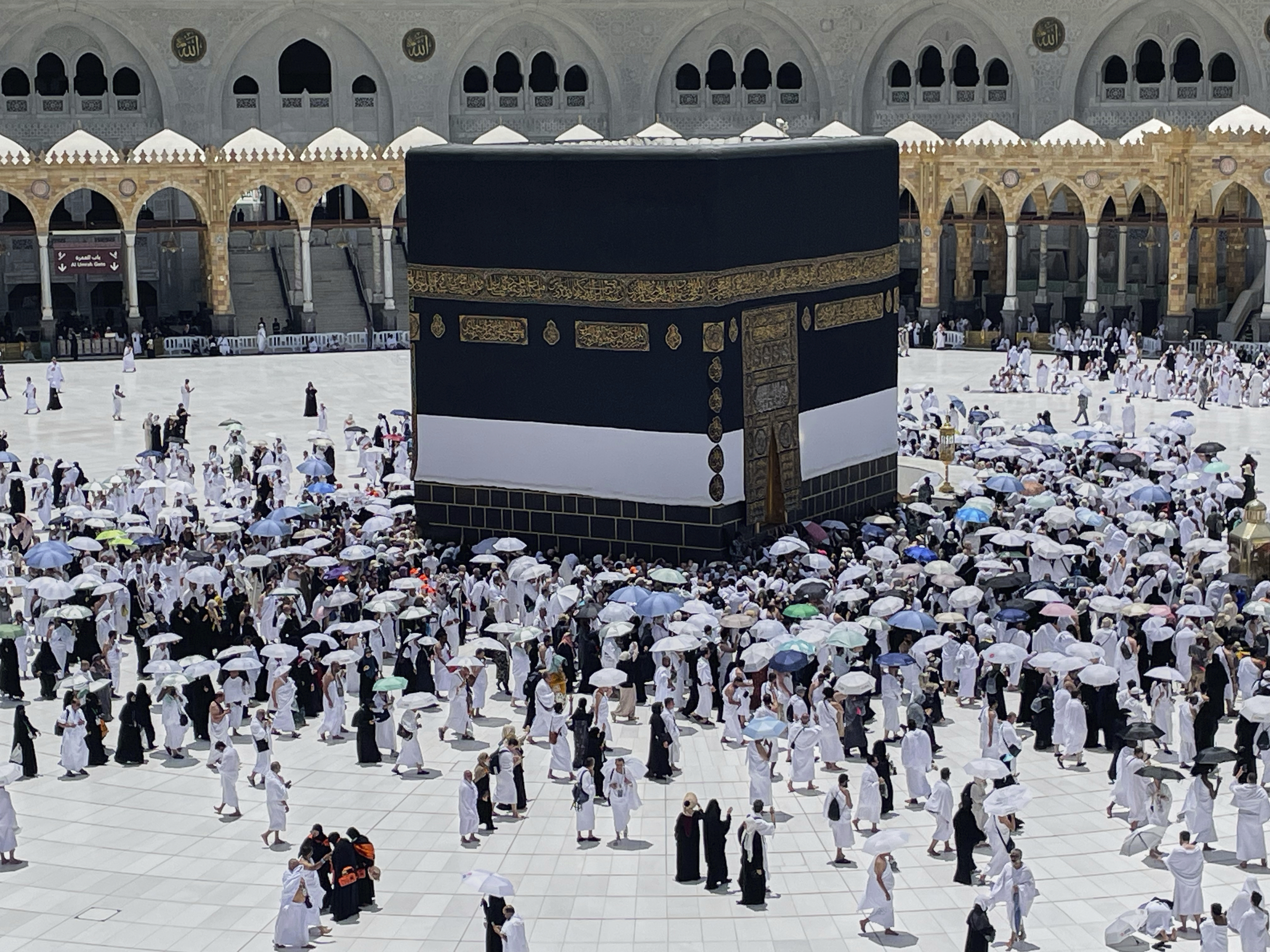 Muslim pilgrims walk around the Kaaba, the cubic building at the Grand Mosque, during the annual Hajj pilgrimage, in the Muslim holy city of Mecca, Saudi Arabia, Wednesday, June 4, 2025. (AP Photo/Amr Nabil)
