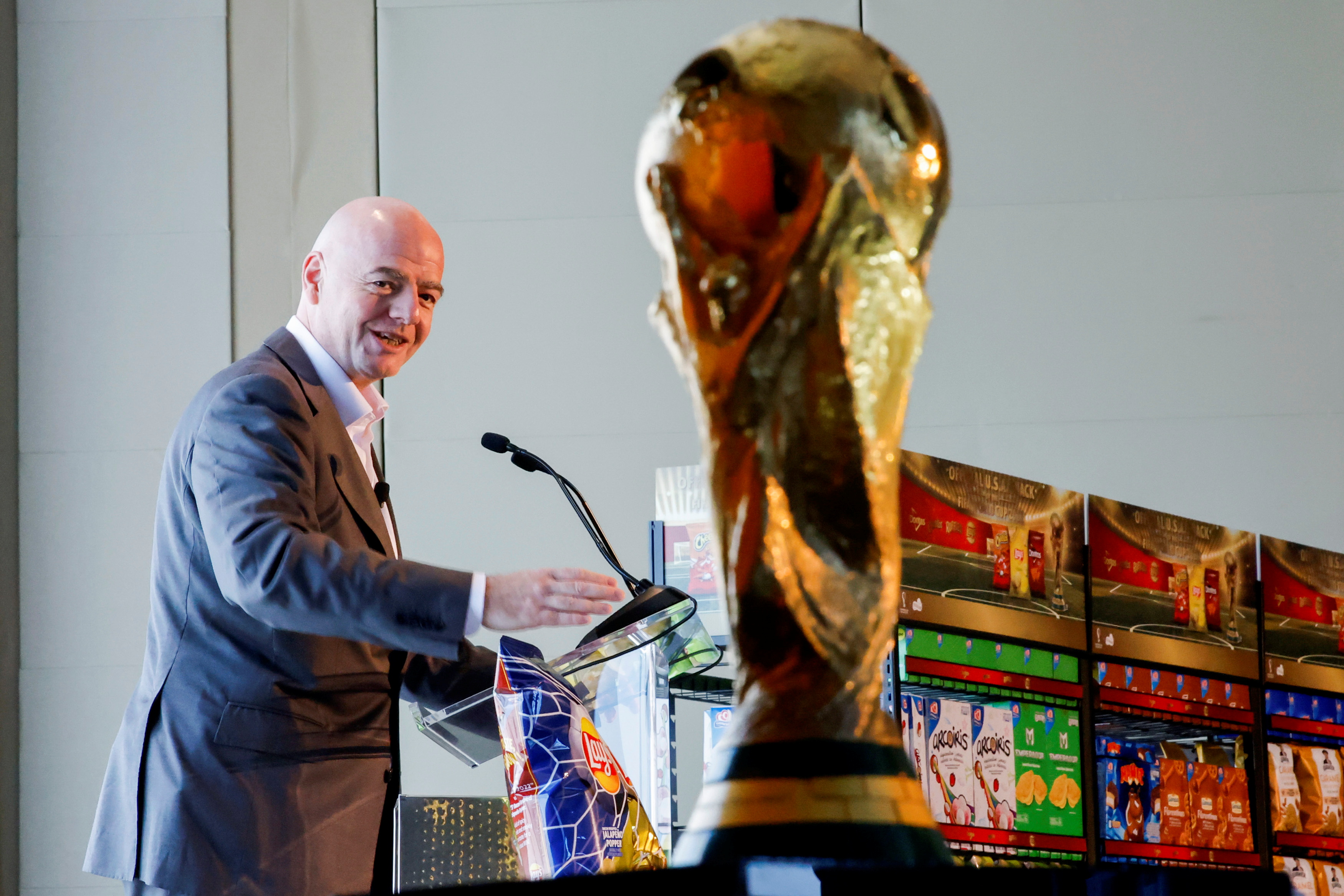 FIFA president Gianni Infantino speaks at FIFA/Frito Lay news conference ahead of 2026 World Cup while the Official FIFA World Cup Trophy is displayed in New York City, New York, US, June 17, 2022.